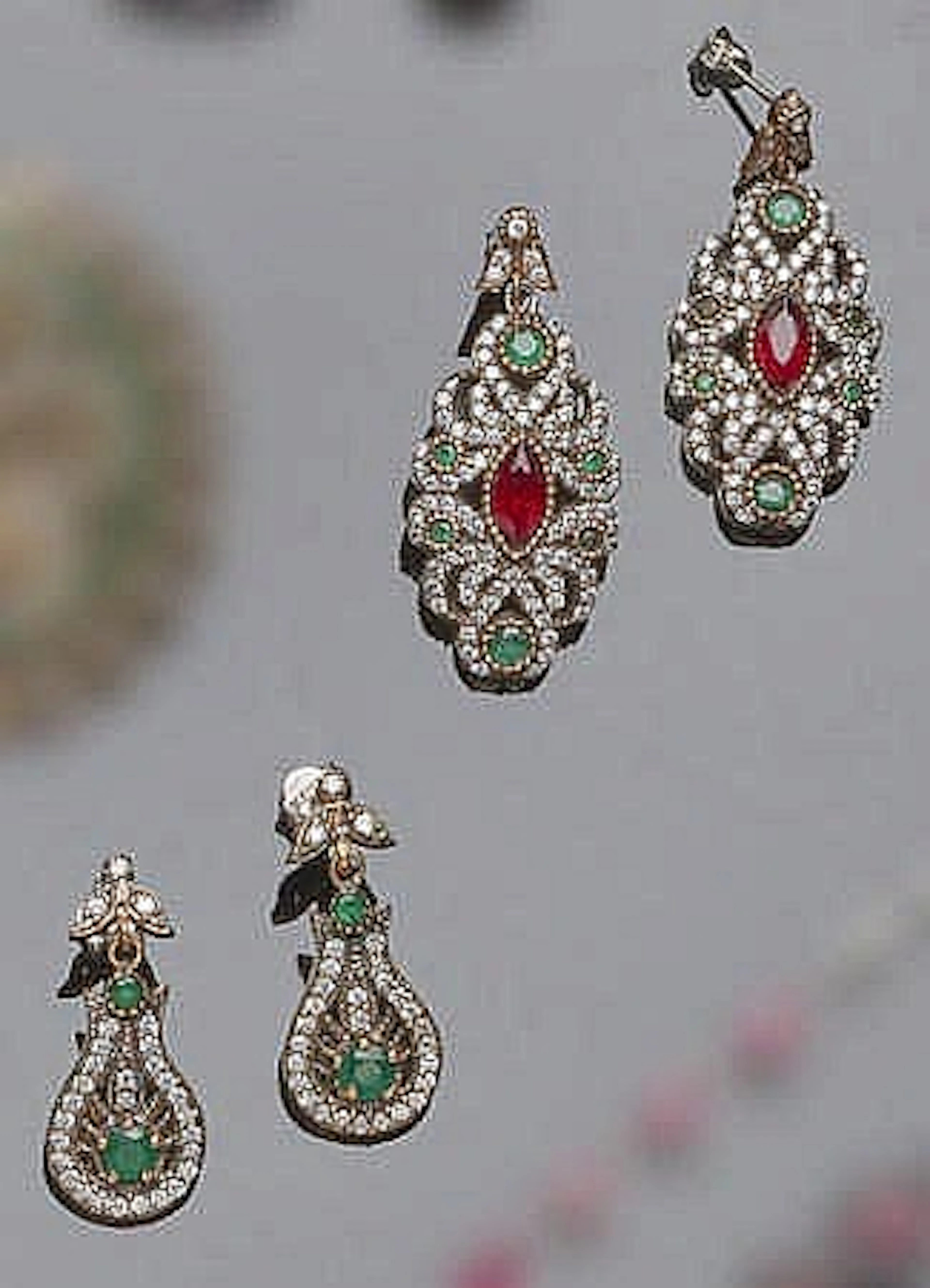 TWO PAIRS OF SILVER, BRONZE, GREEN GEMSTONE AND ZIRCON EARRINGS