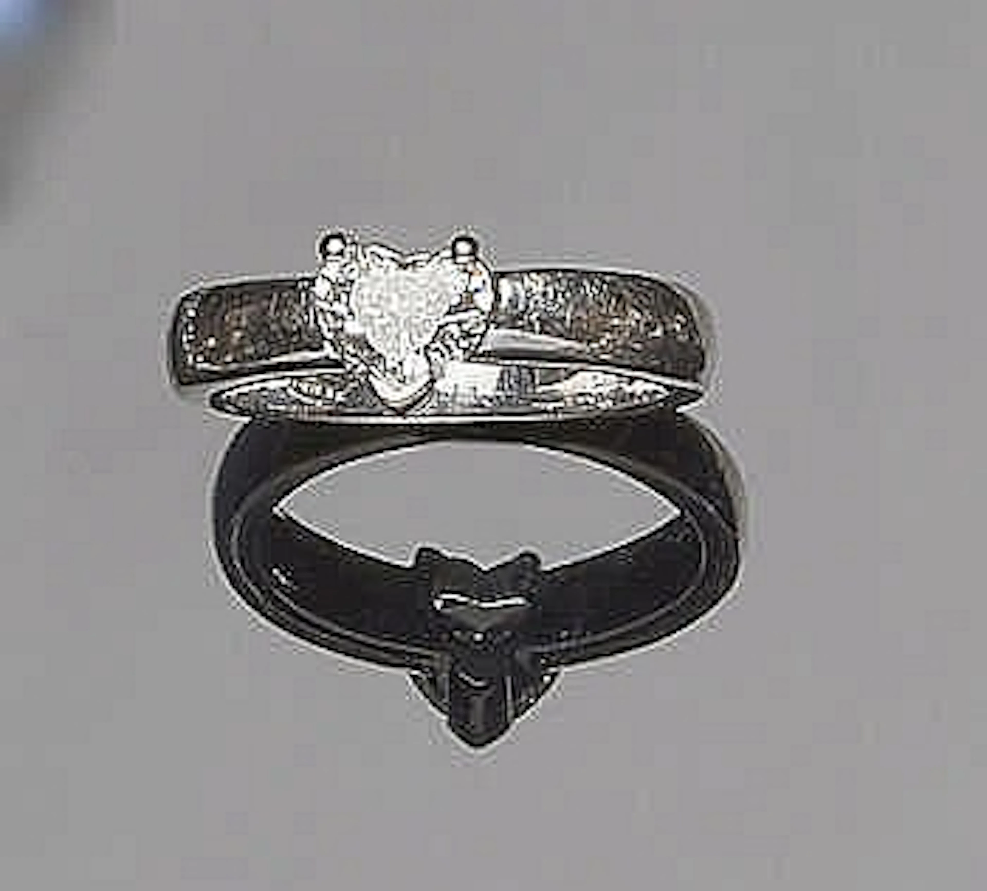 A GOLD AND DIAMOND RING