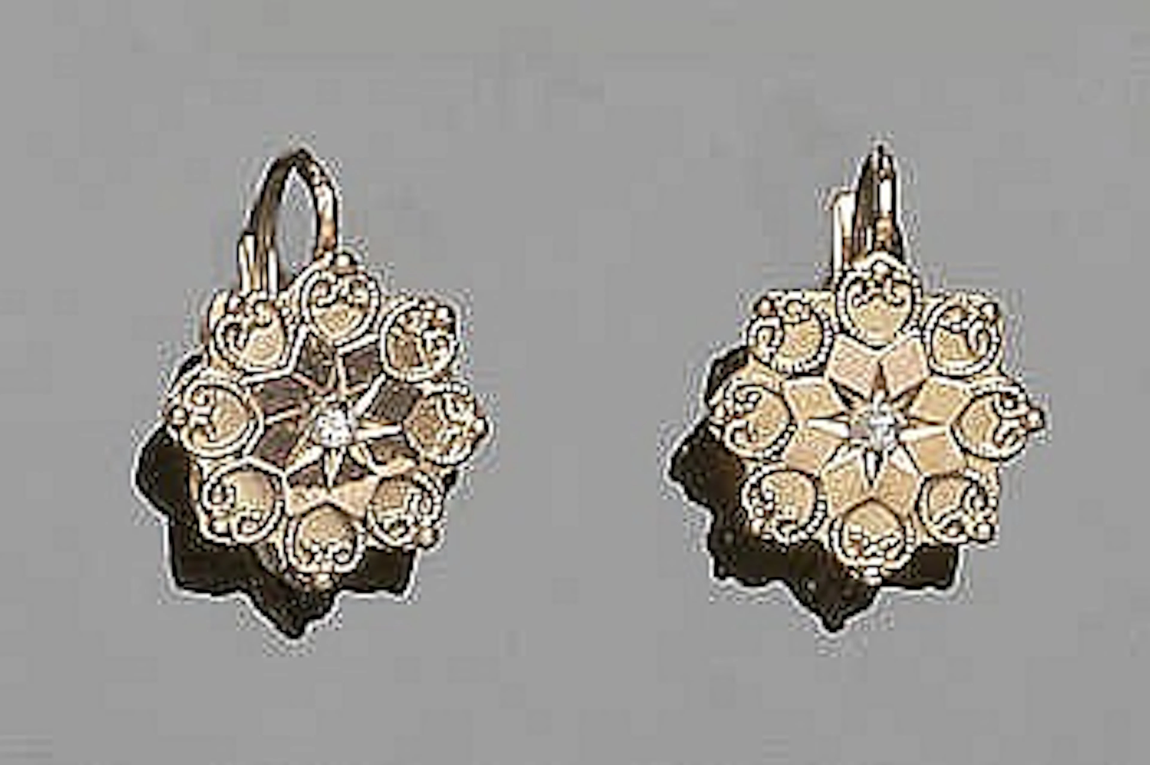 A PAIR OF VINTAGE GOLD AND DIAMOND EARRINGS