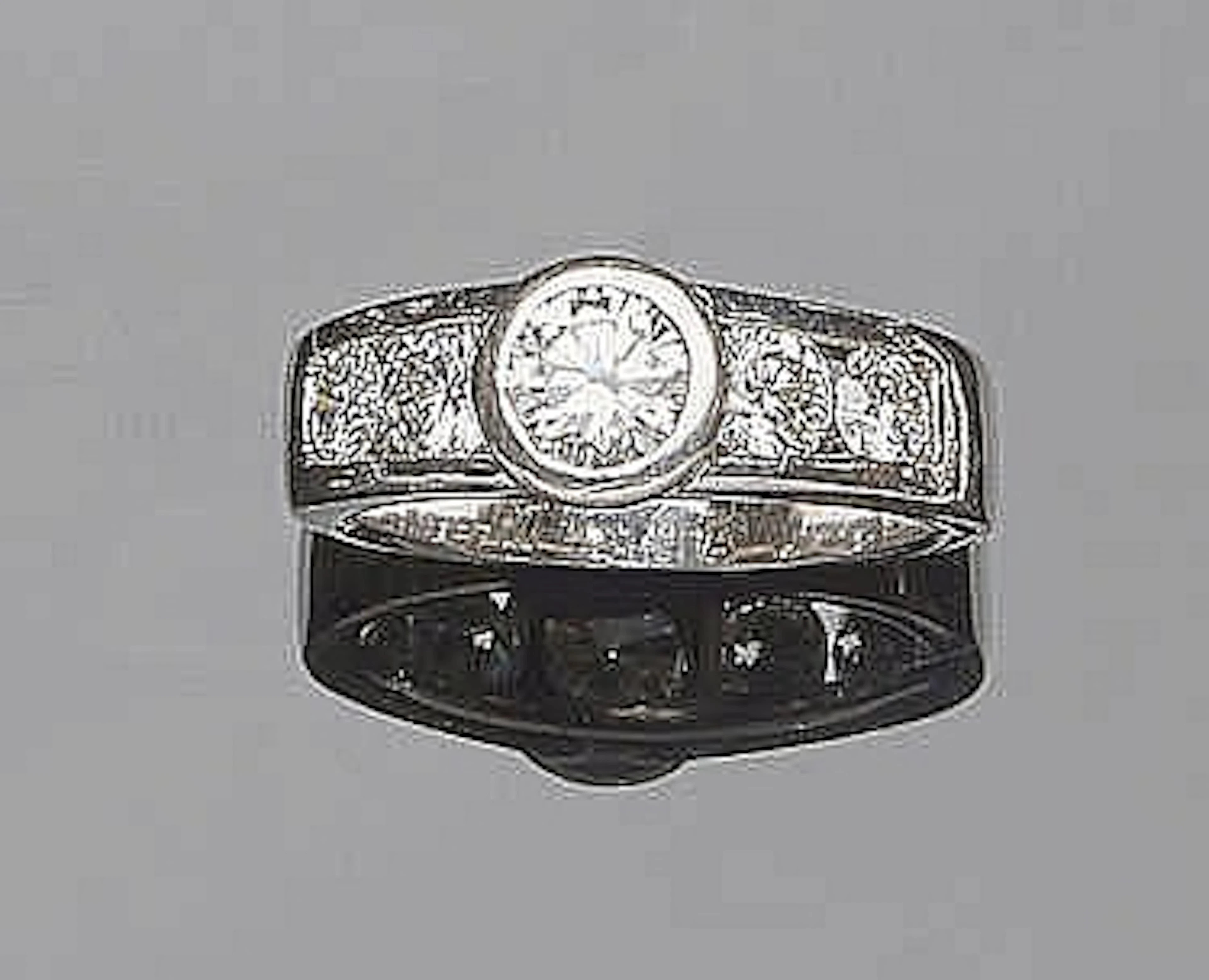 A GOLD AND DIAMOND RING