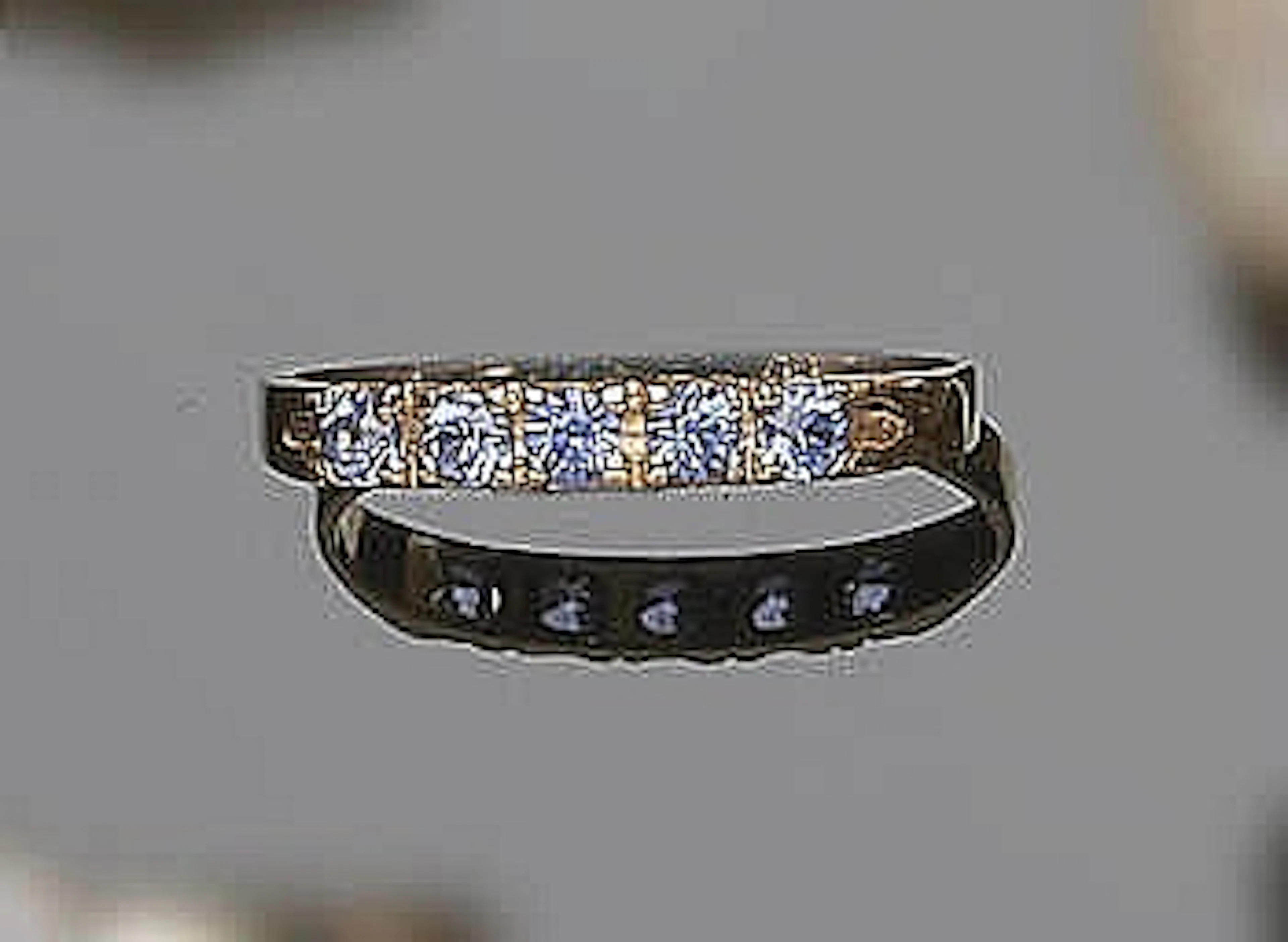 A GOLD AND BLUE GEMSTONE RING