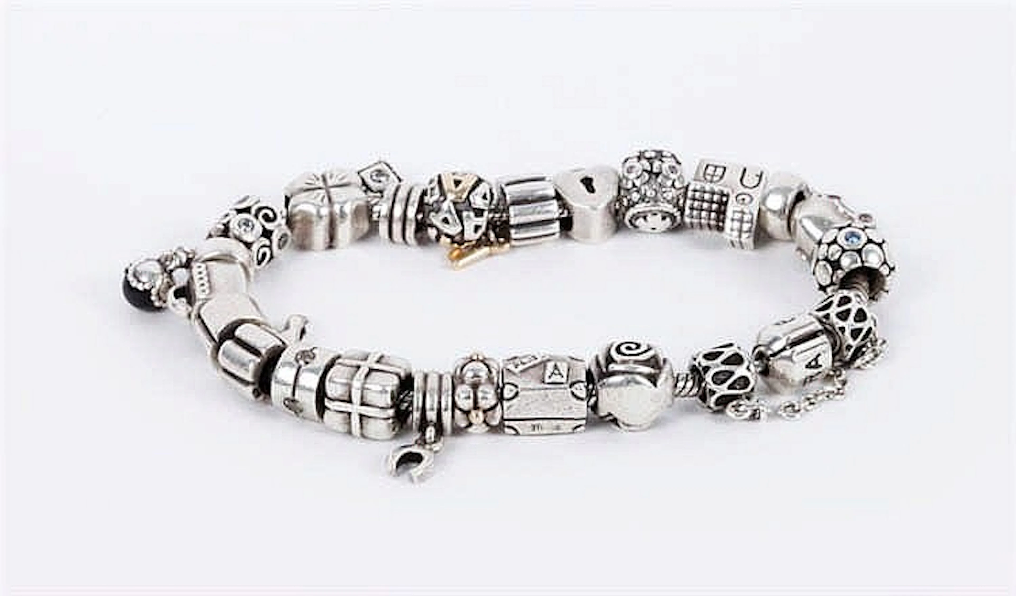 A STERLING SILVER BRACELET, BY PANDORA