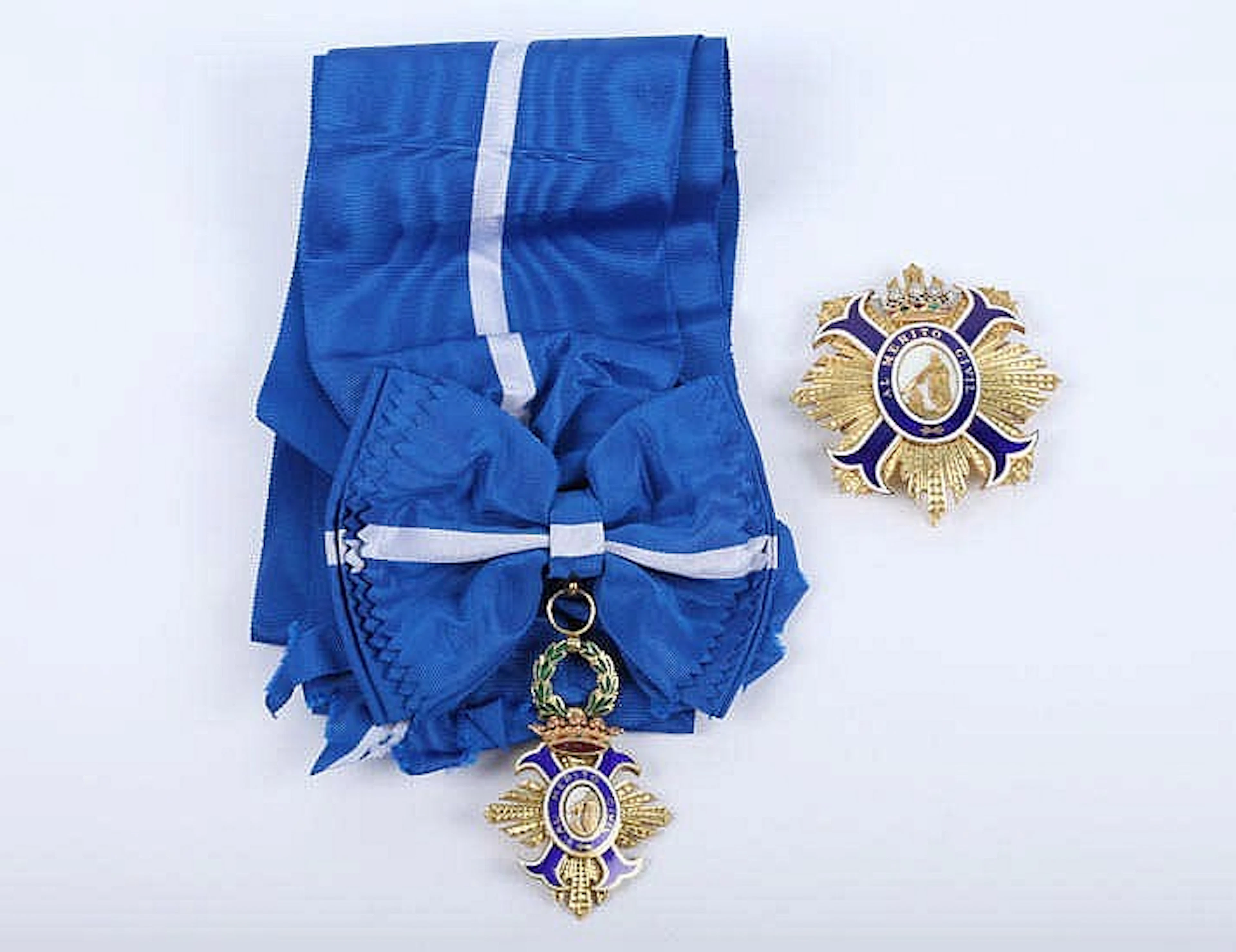 A GILT SILVER AND ENAMEL MEDAL AND AWARD OF THE ORDER OF CIVIL MERIT