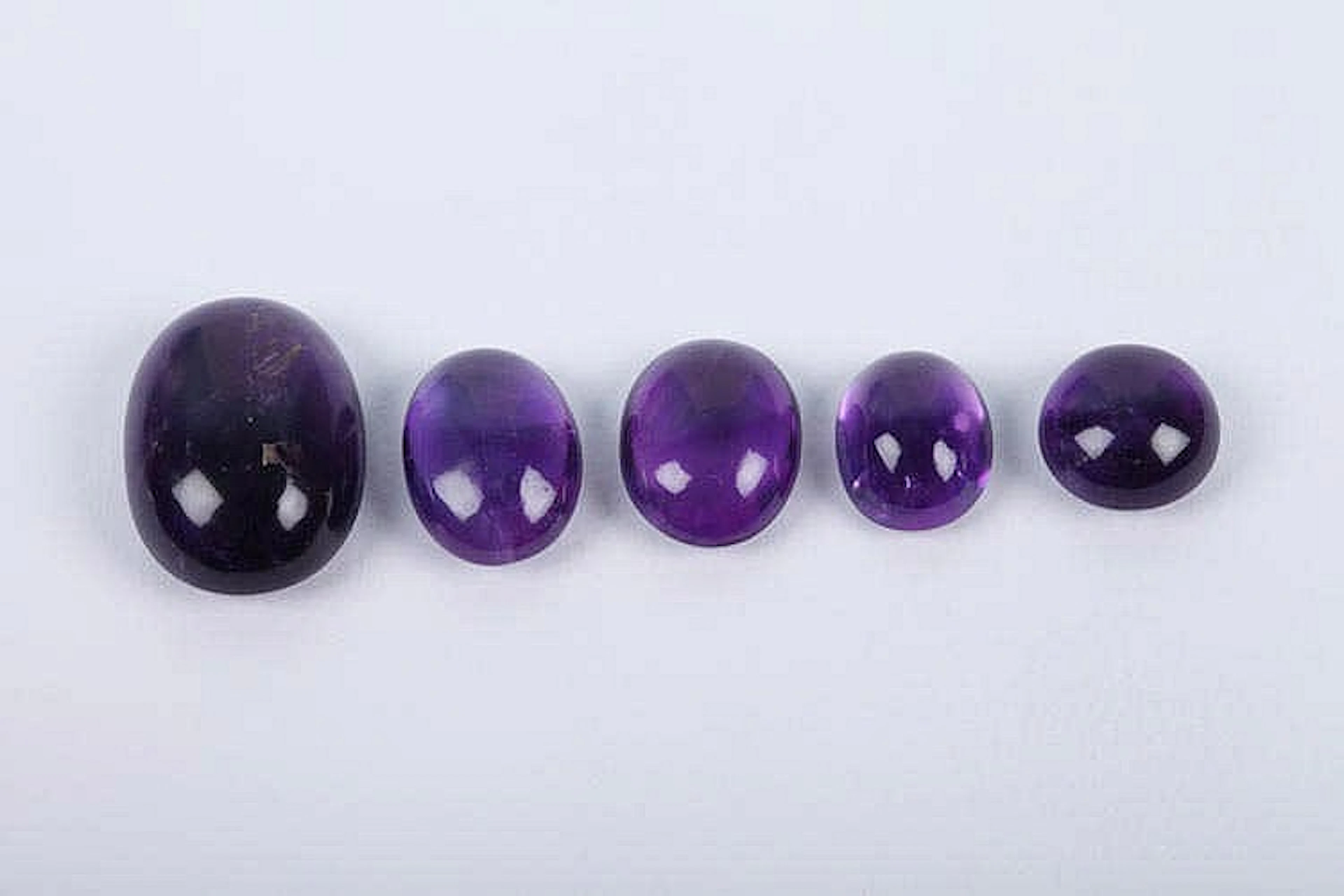 FIVE AMETHYST GEMSTONES