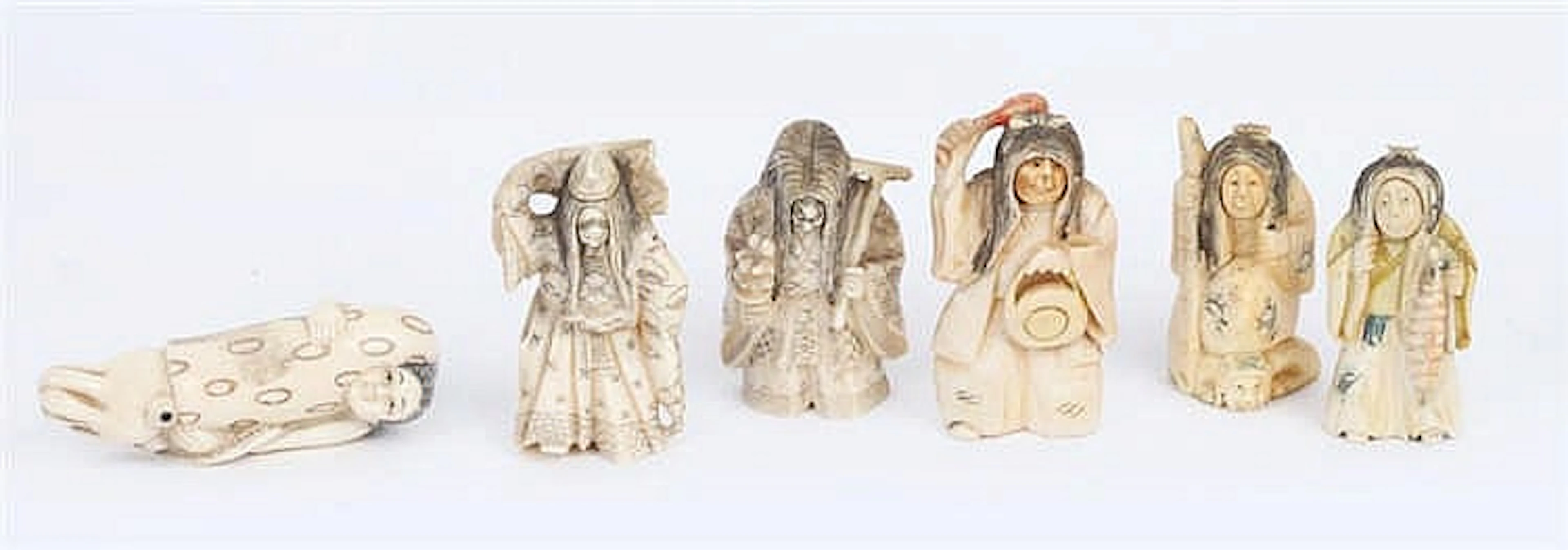 A GROUP OF SIX JAPANESE VINTAGE IVORY NETSUKES