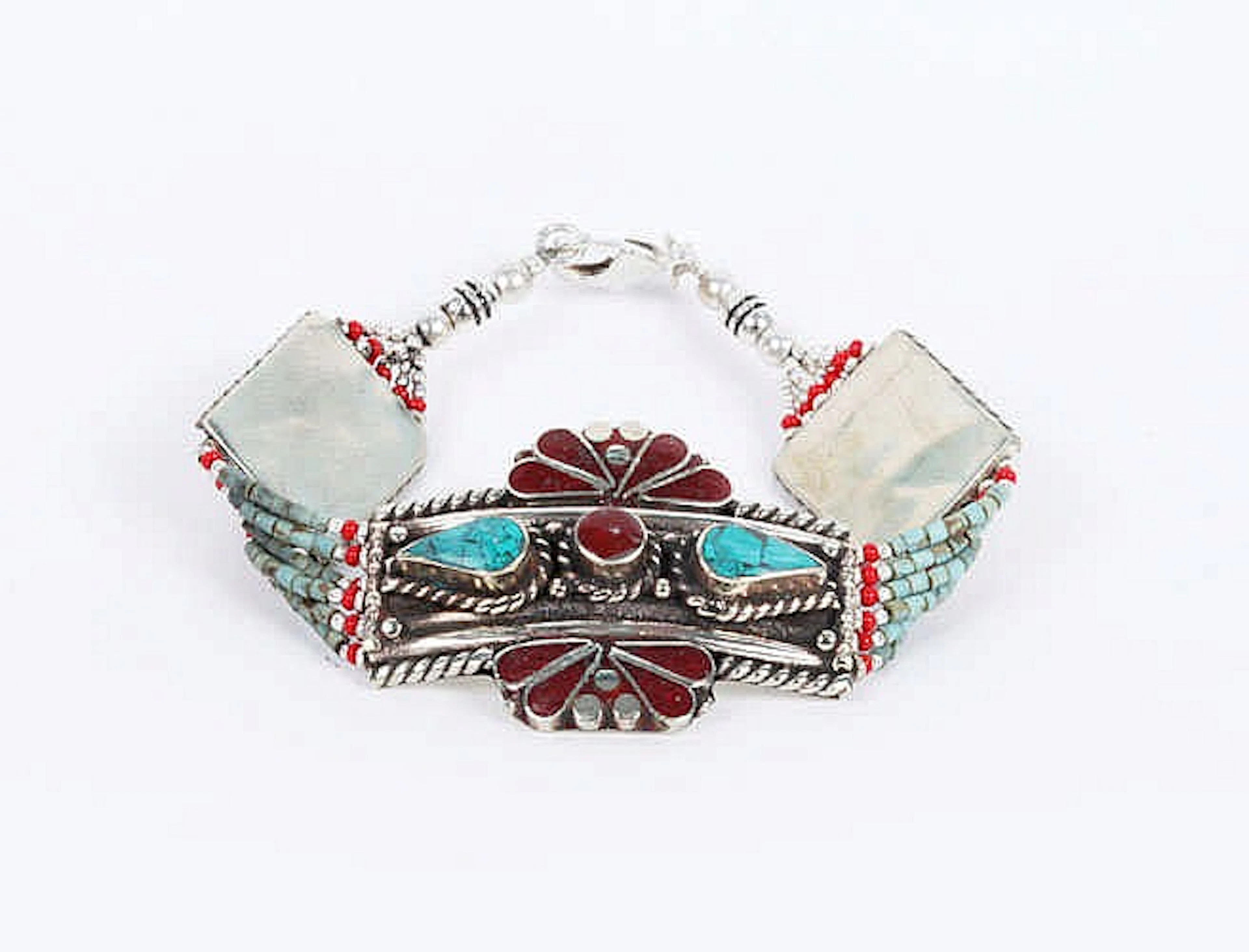 AN ENAMEL, CORAL AND TURQUOISE BRACELET