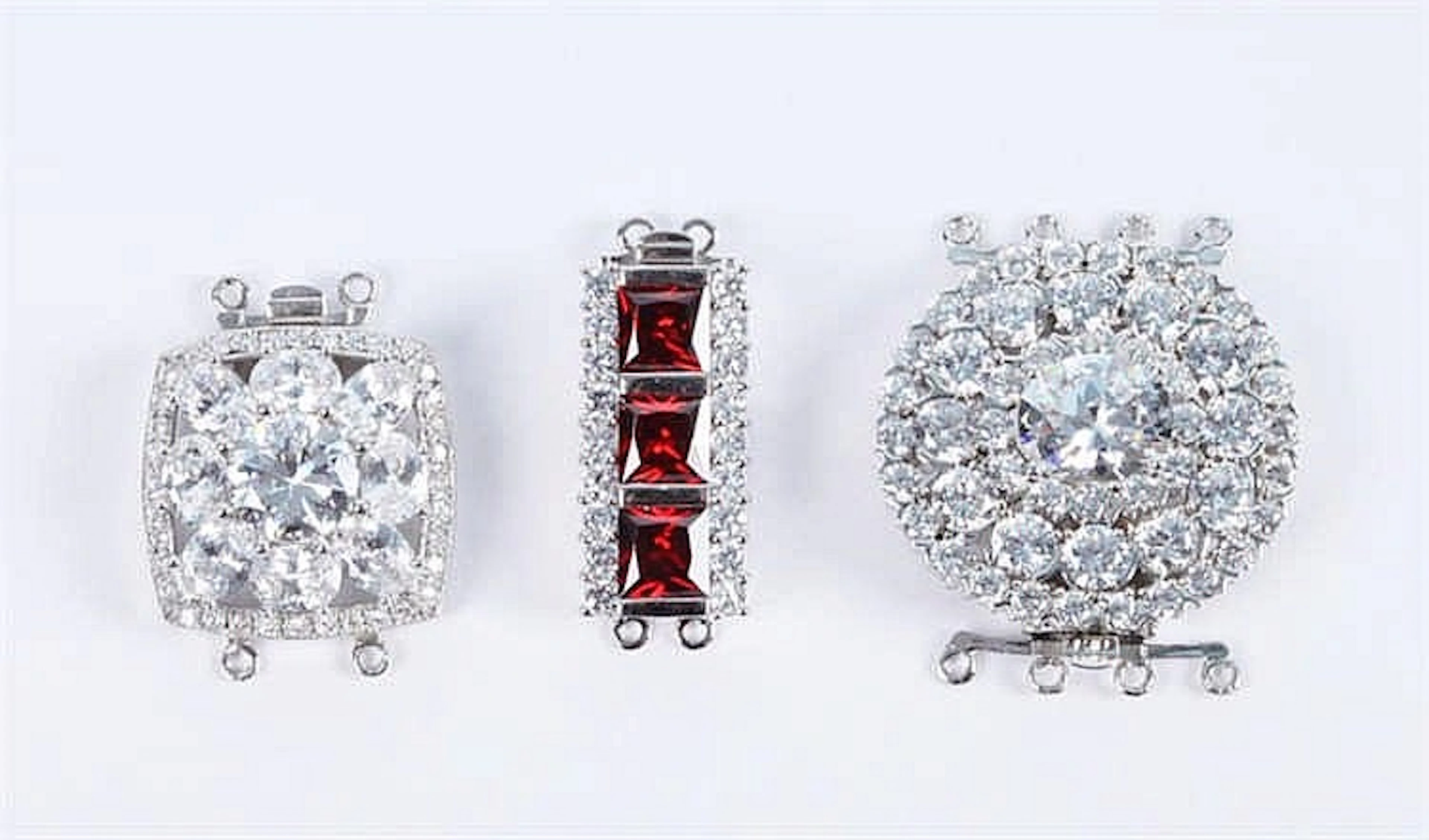 THREE STERLING SILVER NECKLACE CONNECTORS