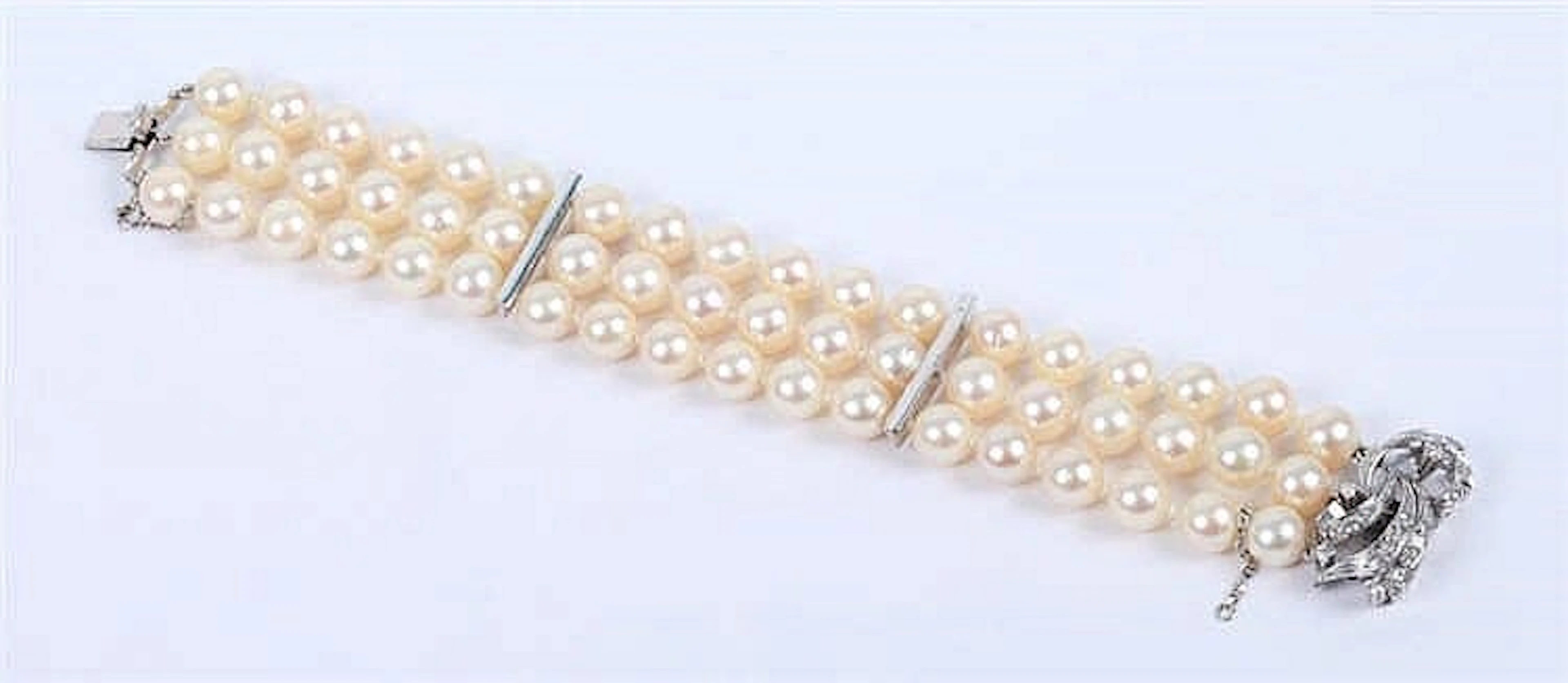 A VINTAGE PEARL AND DIAMOND BRACELET
