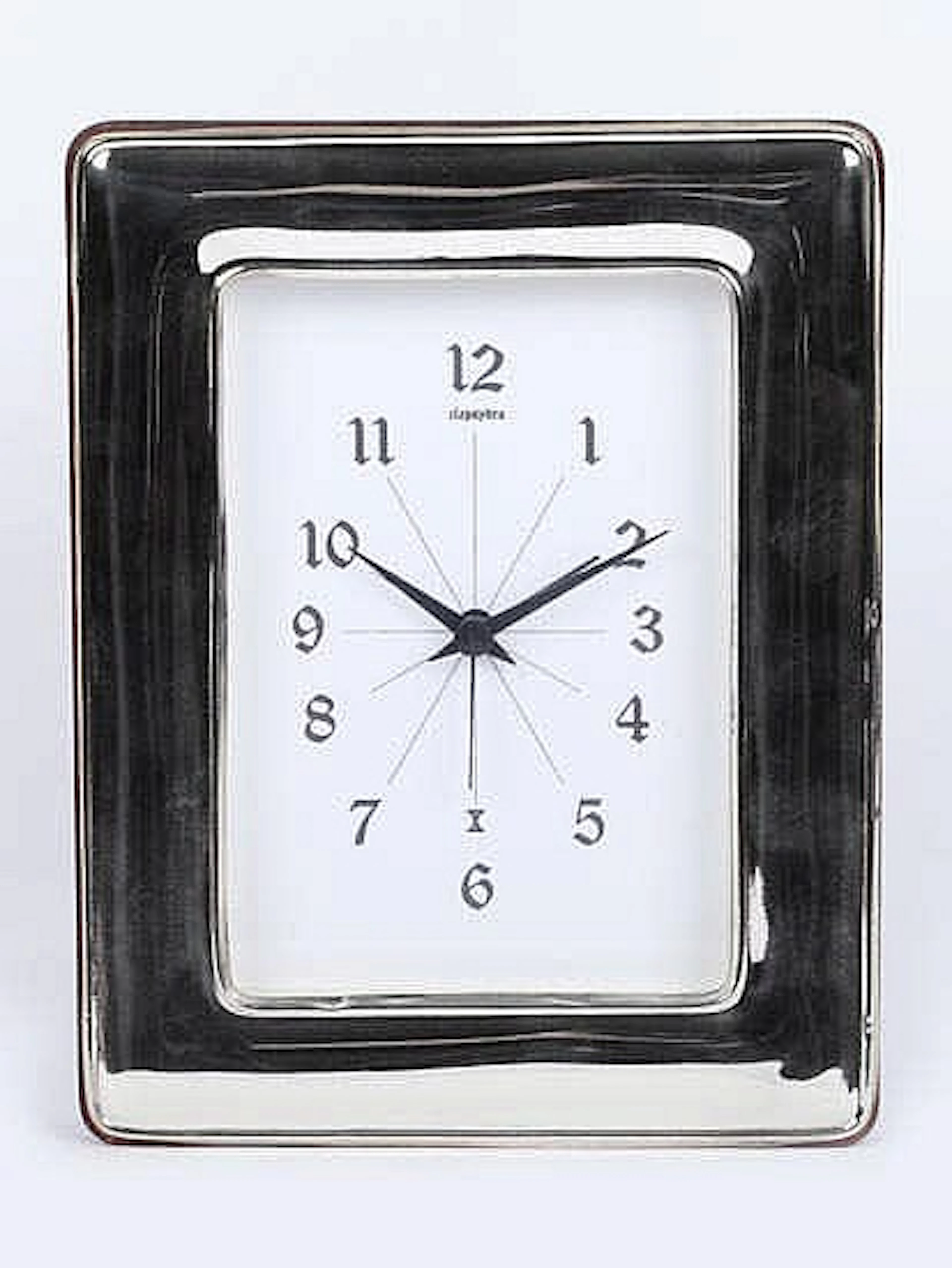A SILVER TABLE CLOCK