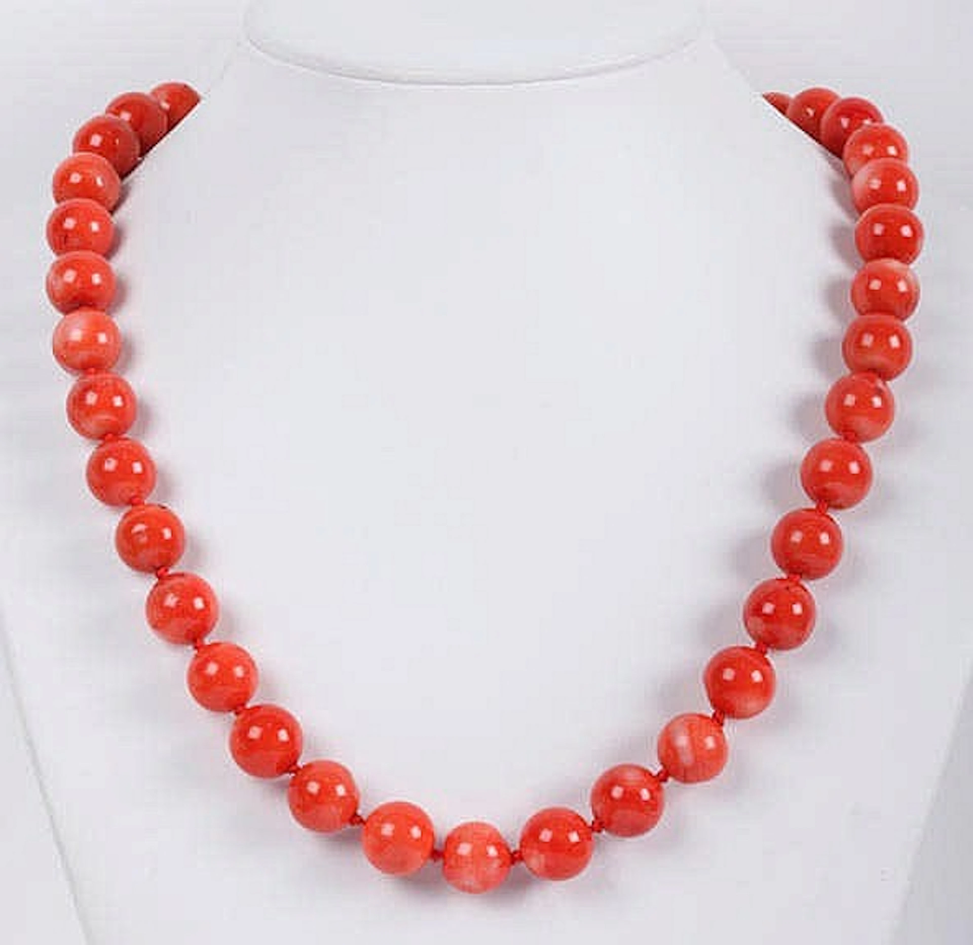 A CORAL BEAD NECKLACE