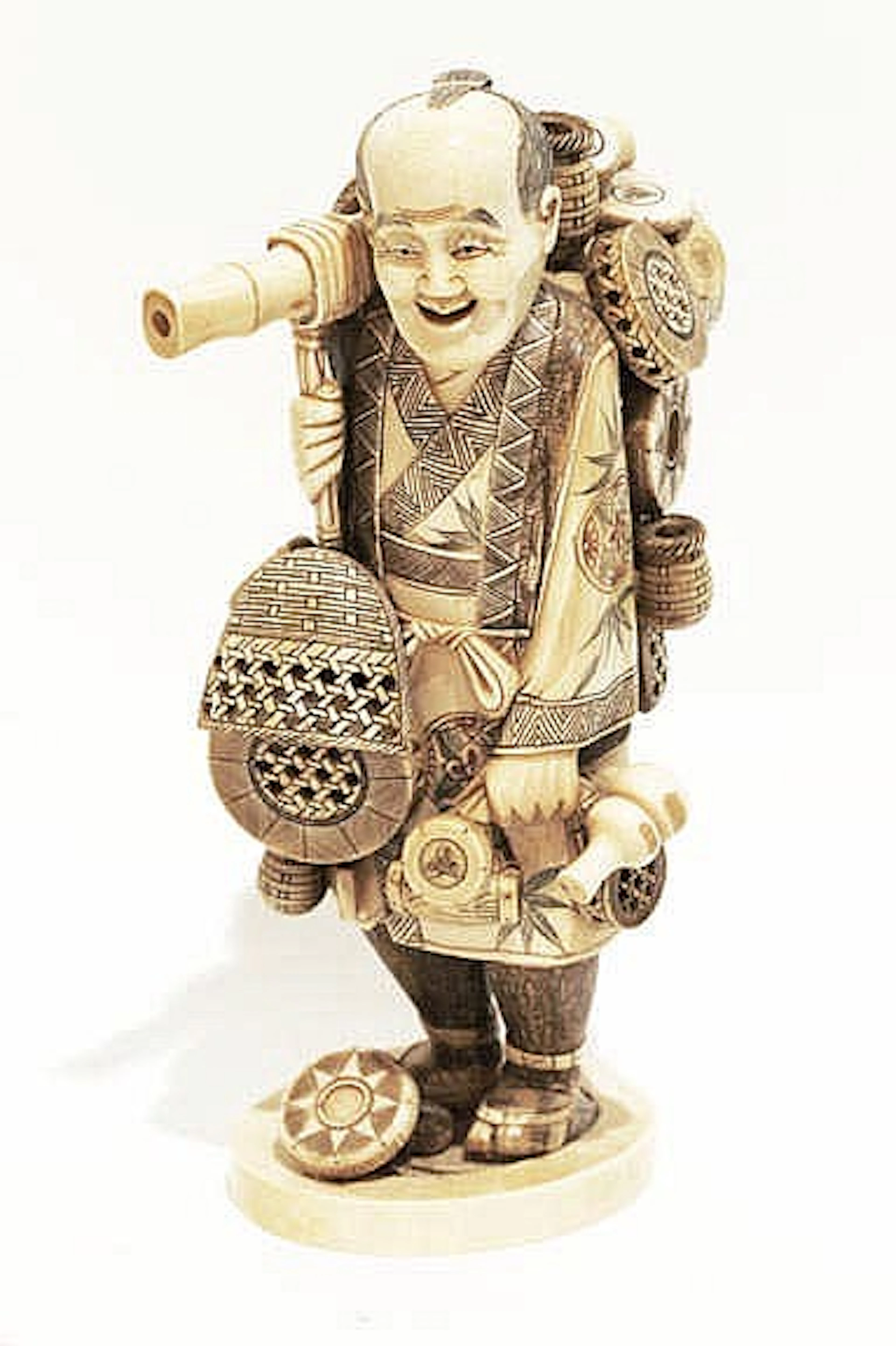 A CHINESE CARVED IVORY FIGURE