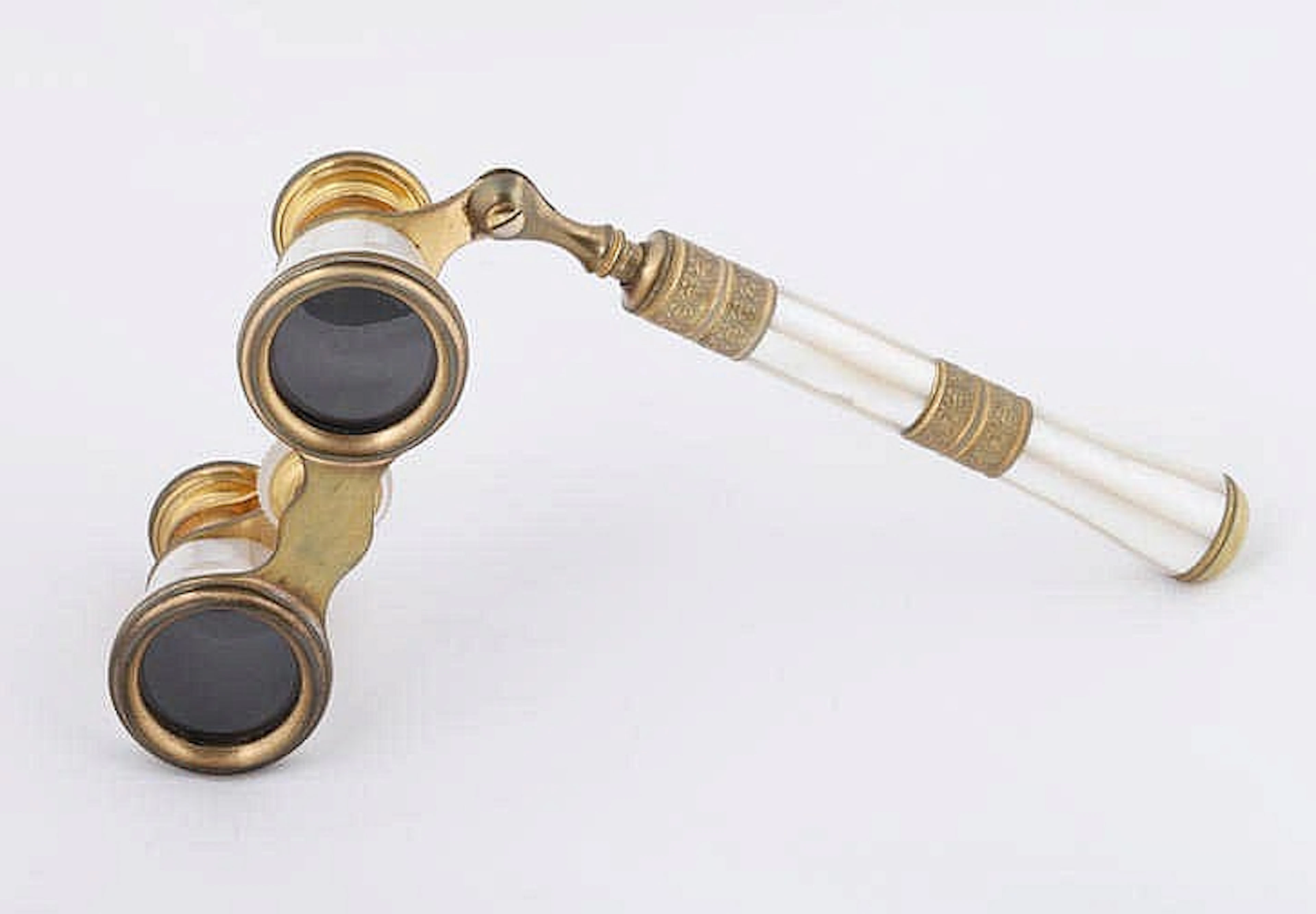 A PAIR OF FRENCH MOTHER OF PEARL AND BRONZE OPERA GLASSES
