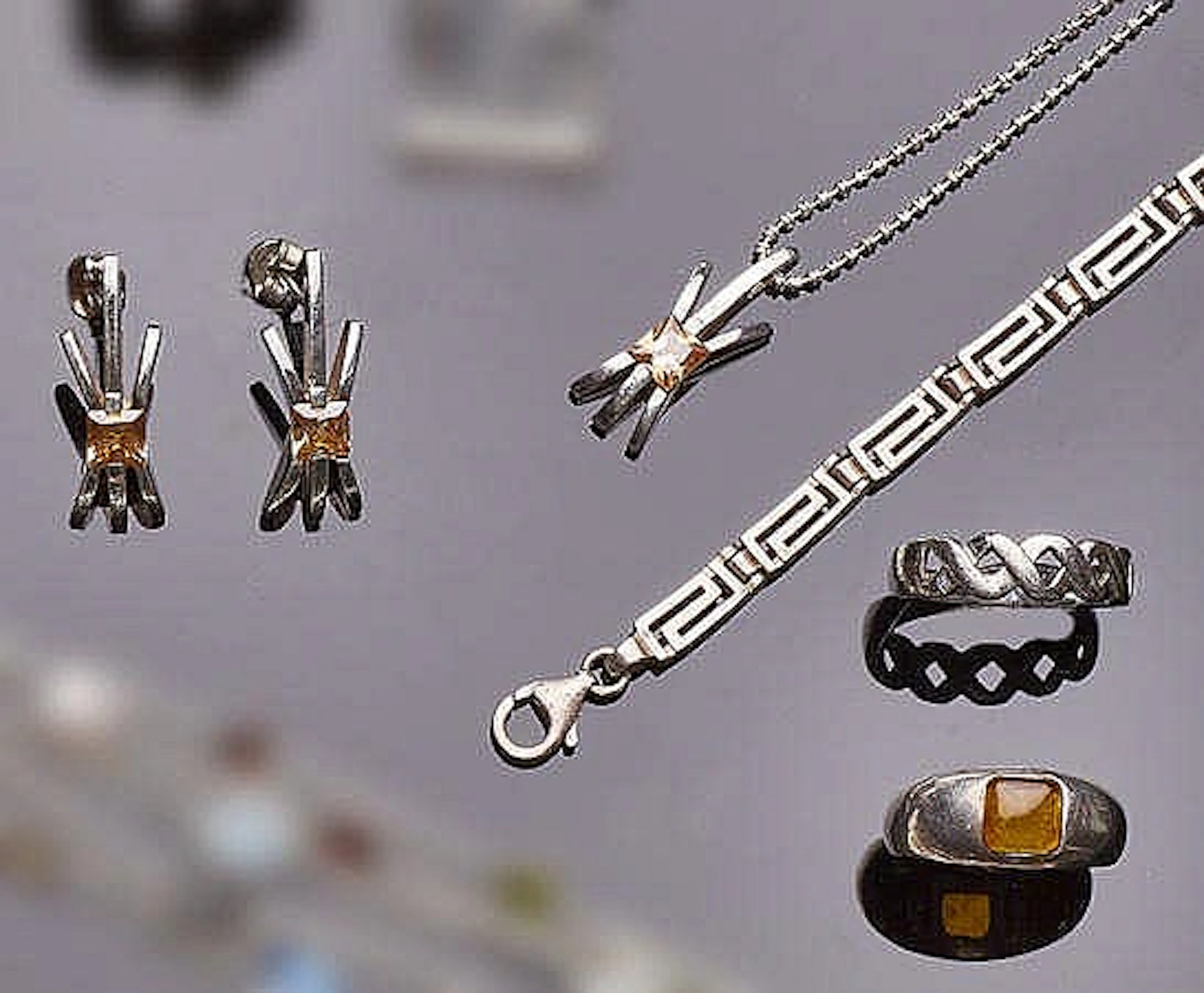 A GROUP OF SILVER JEWELRY