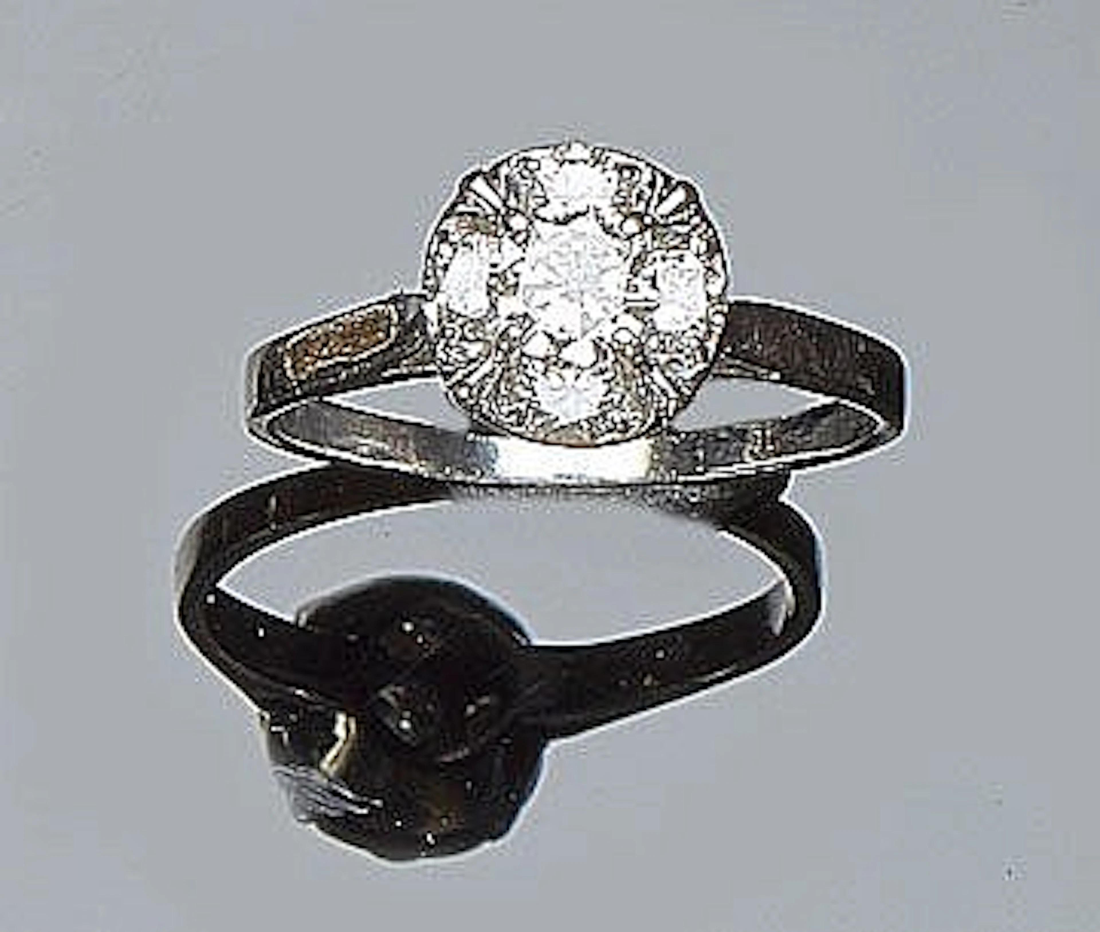 A VINTAGE WHITE GOLD AND DIAMOND RING