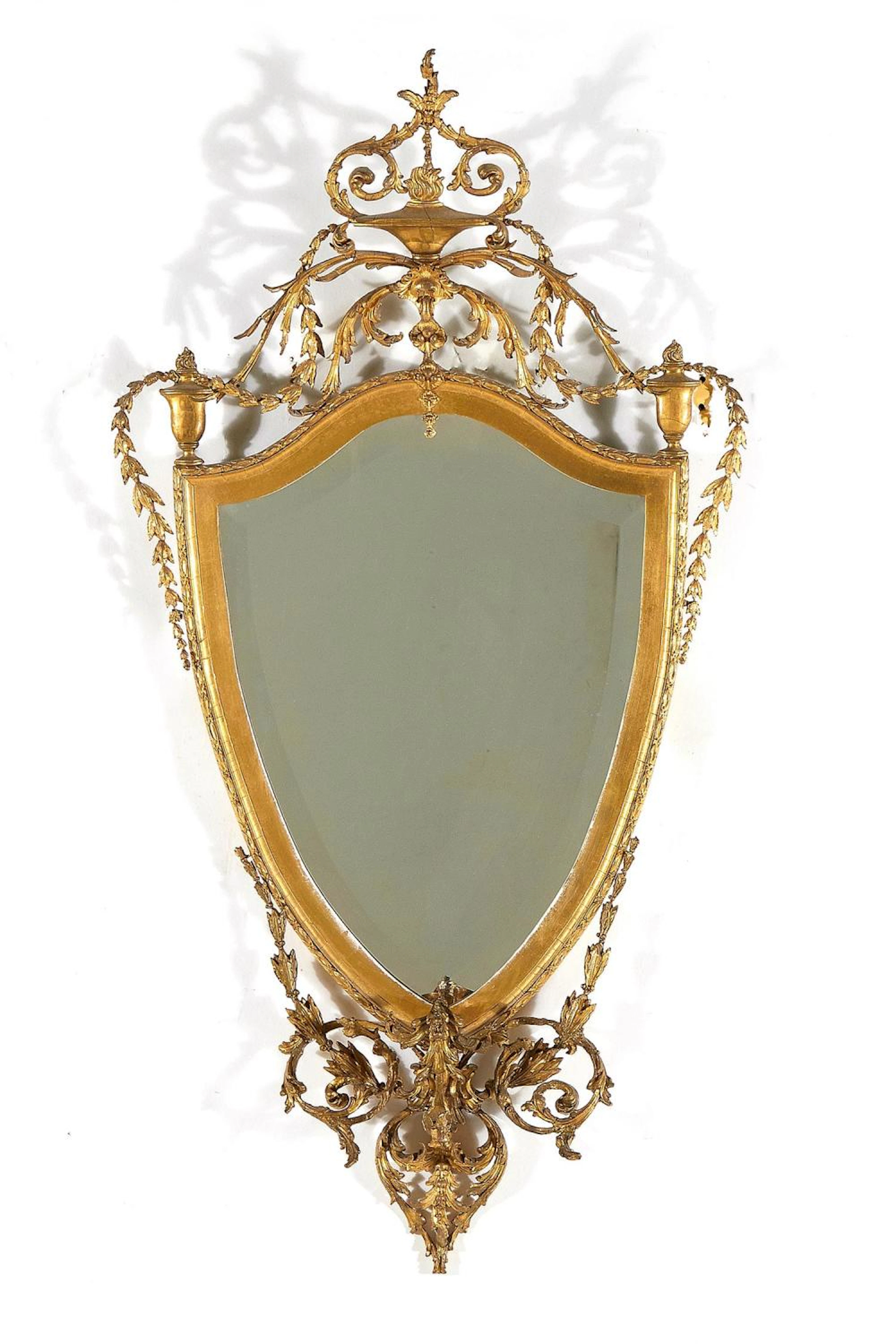 Adam Style Carved Giltwood Shield-Shaped Mirror