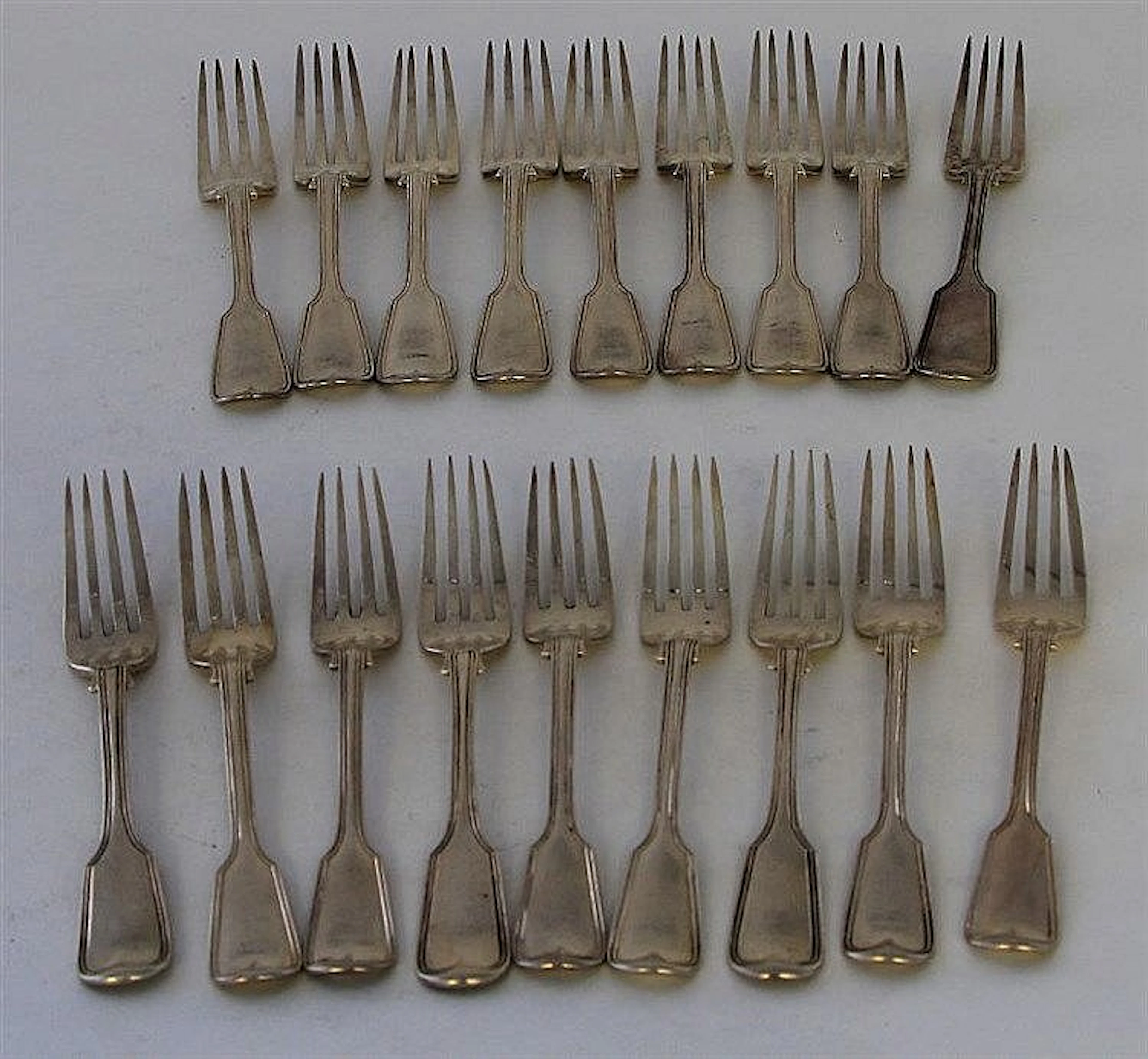 A Victorian matched set of Fiddle and Thread patte