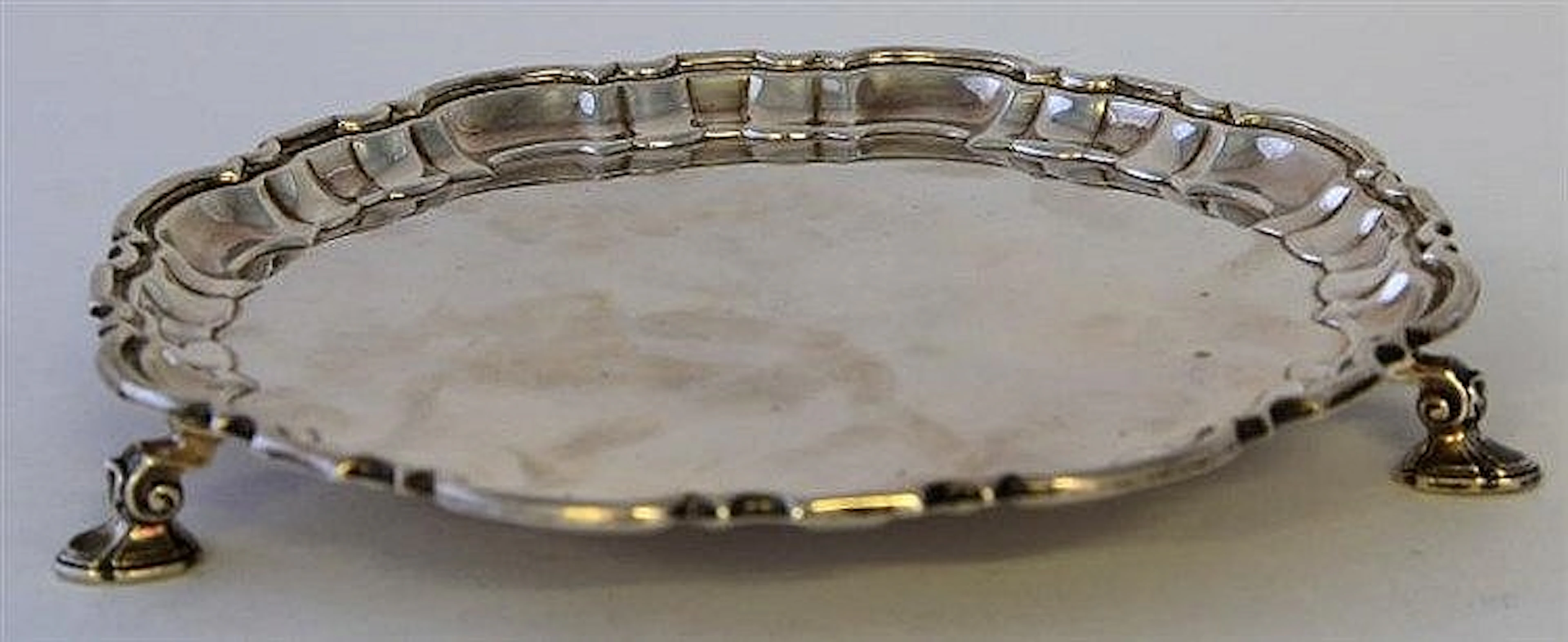 A modern silver waiter Of conventional form, with