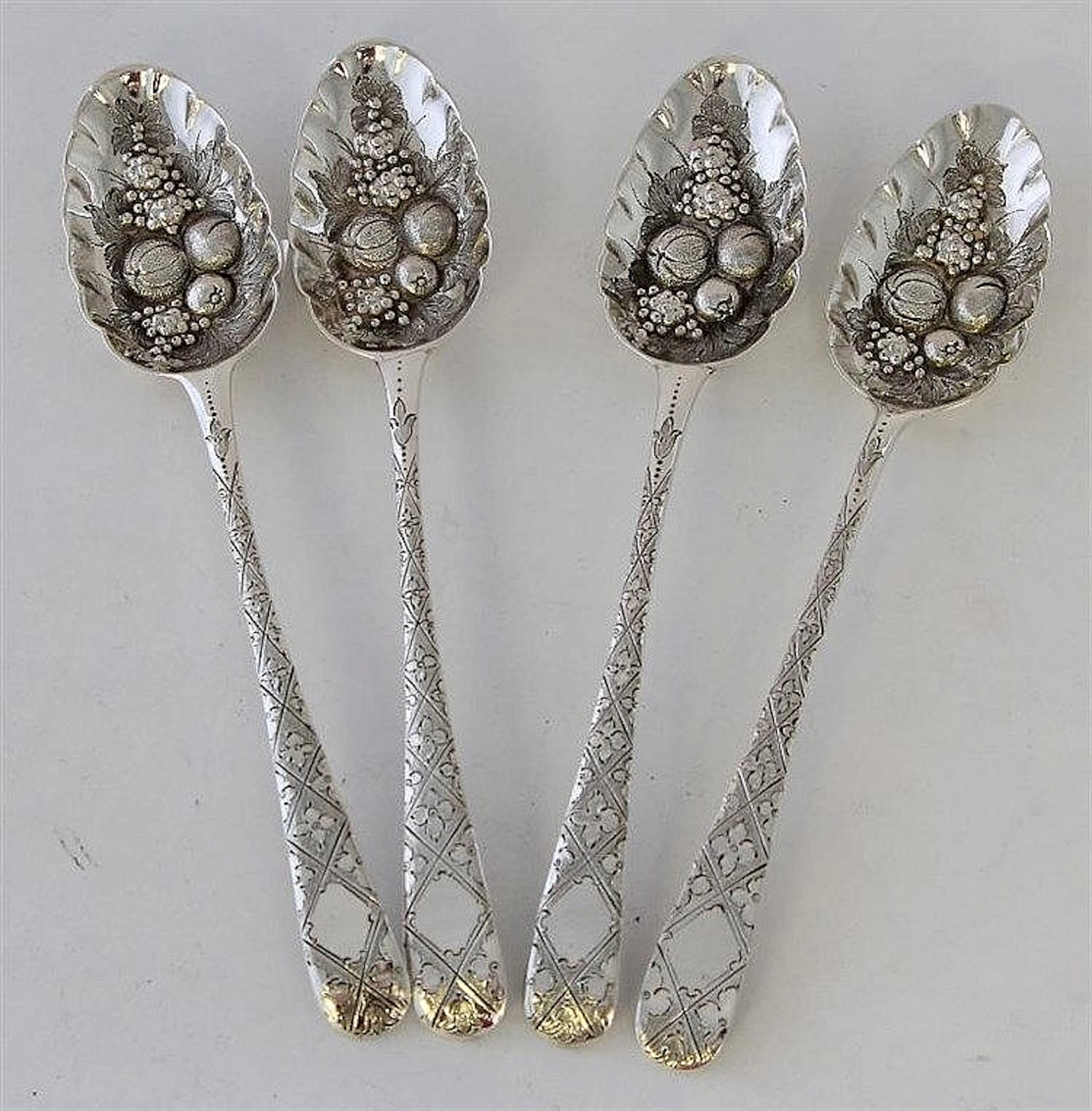 A George III silver set of four berry spoons Of co