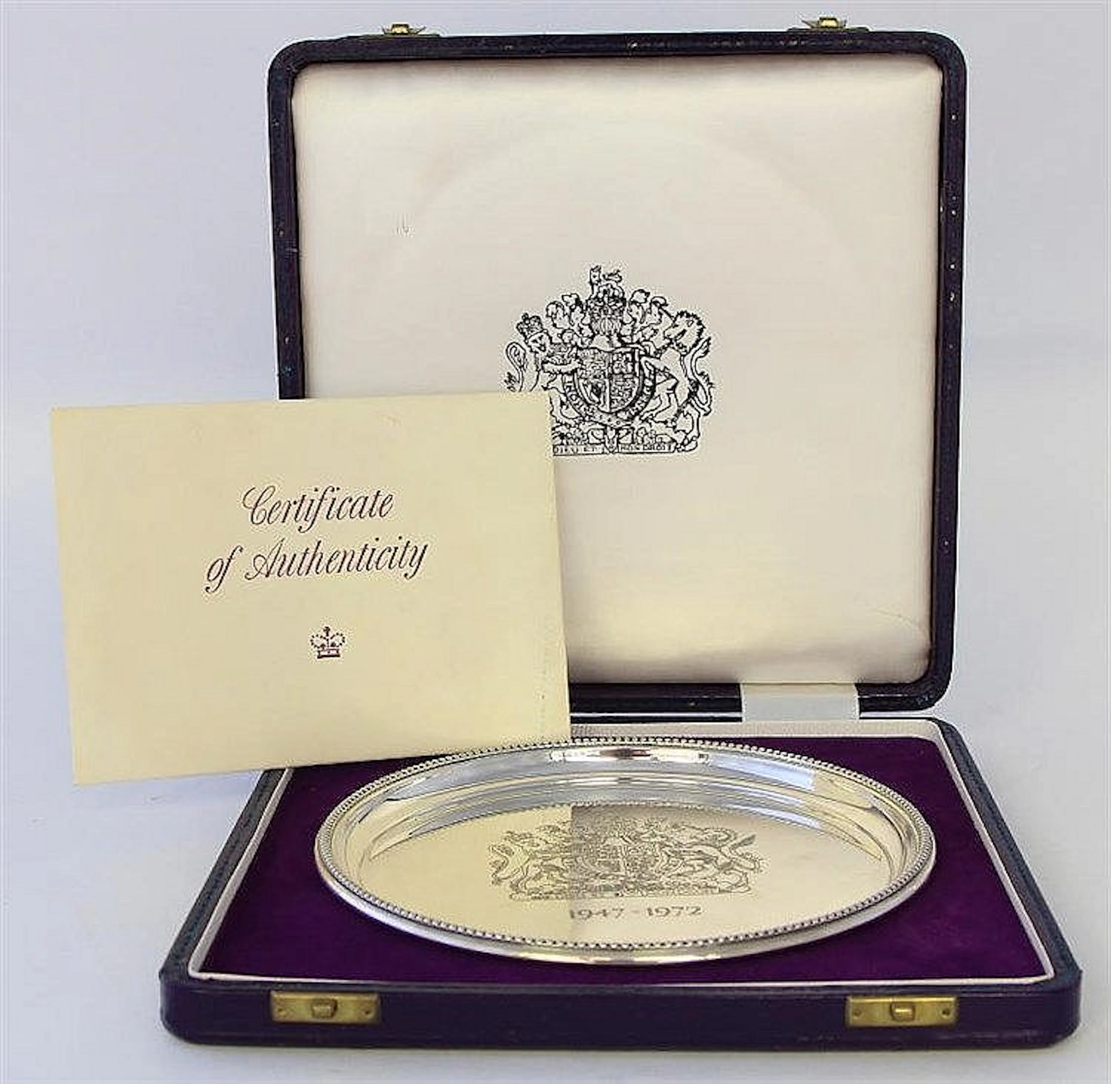 A commemorative limited edition silver salver Com