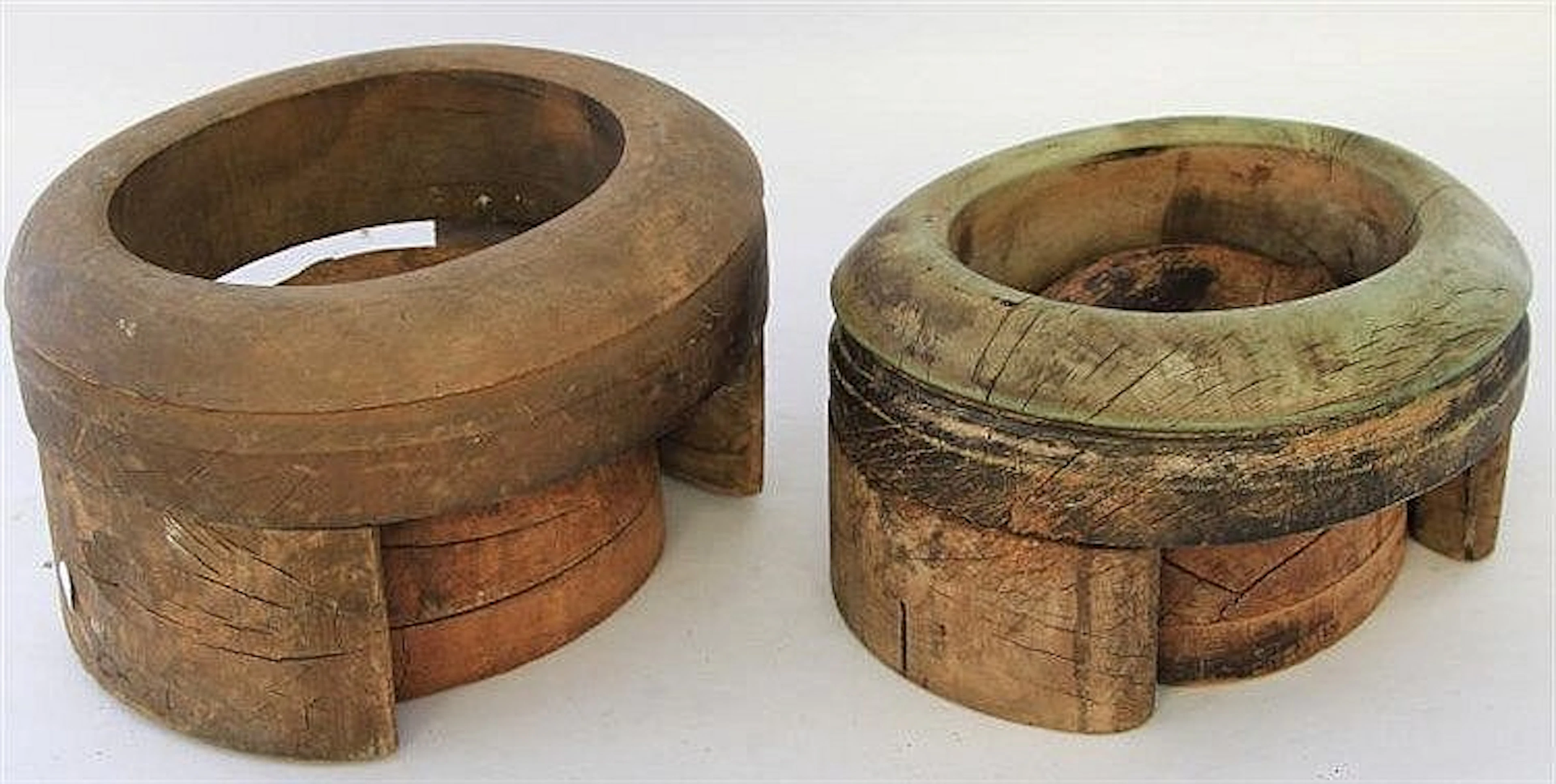 Two vintage fruitwood hat blocks and stands Each o
