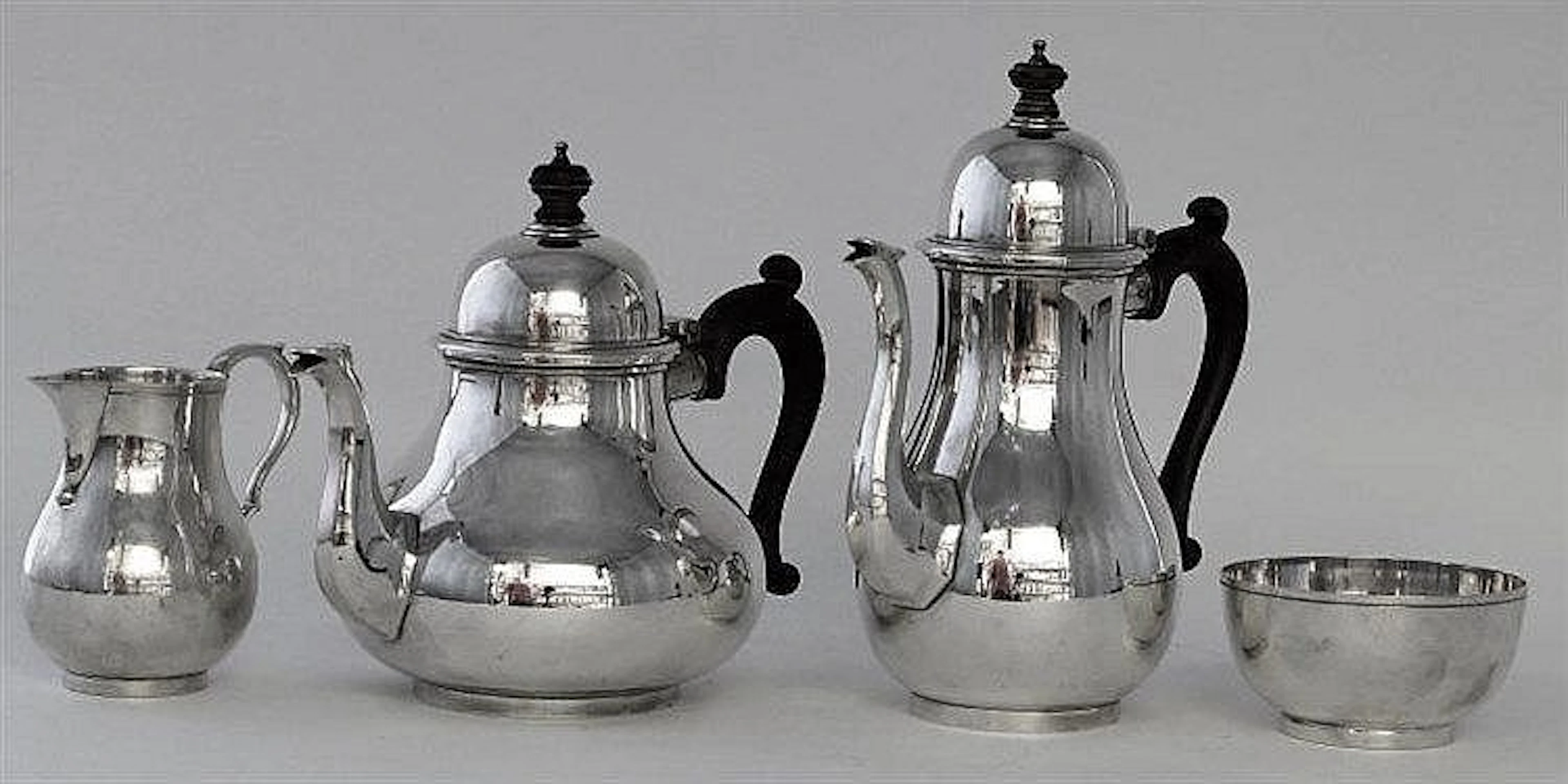 A silver four piece tea and coffee service Of pla