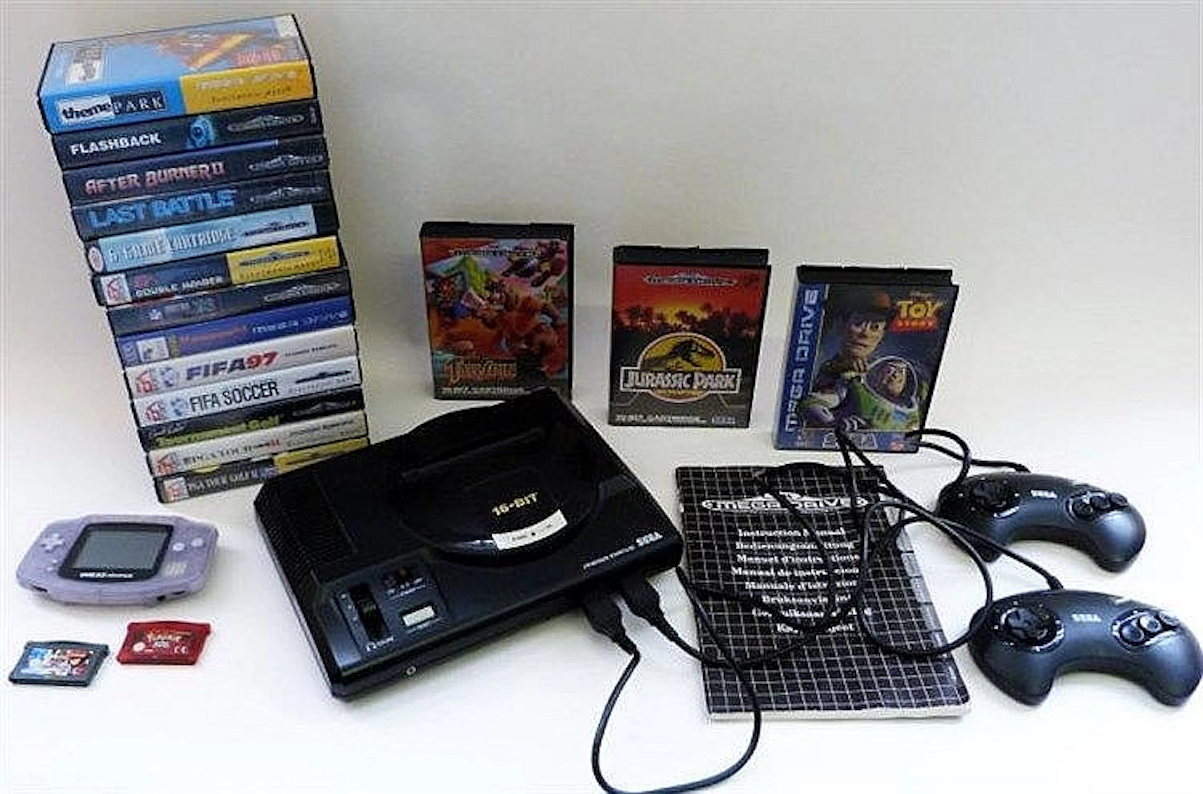 Two Video Game Consoles Includes a 'Sega Mega Driv