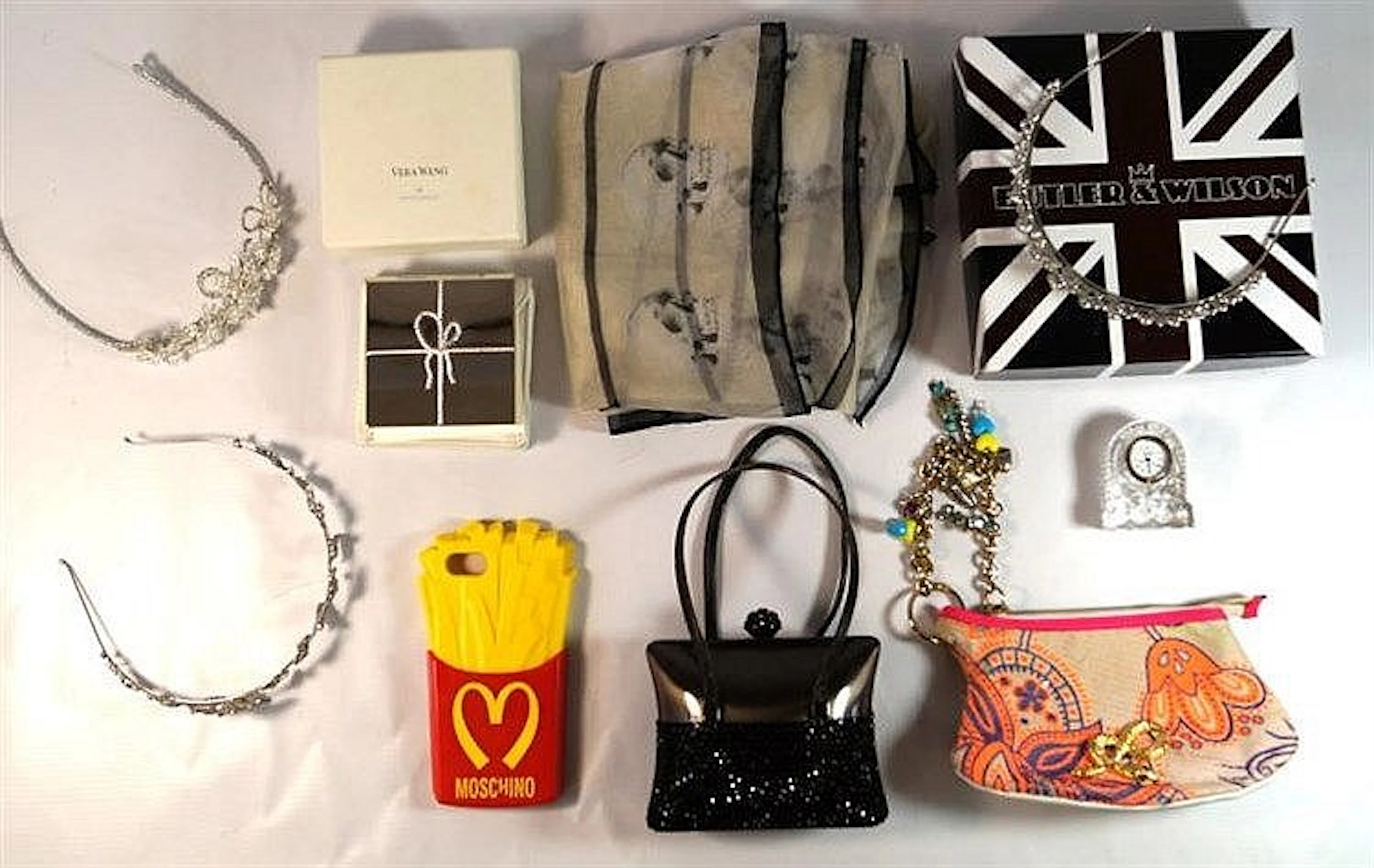A collection of various designer collectible items To include a Moschino m