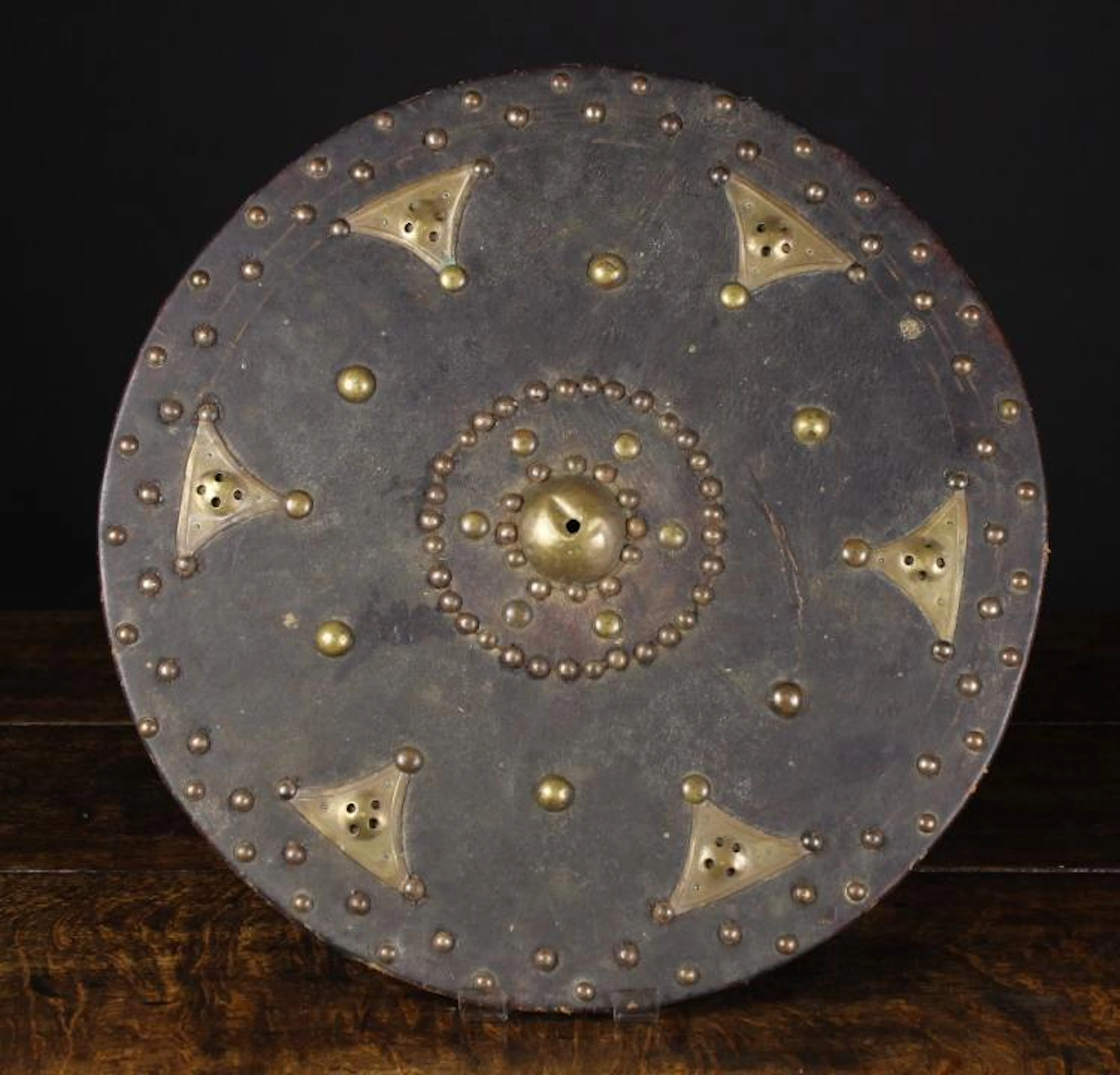 A Scottish Highlander's Leather-clad Wooden Targe or Sheild