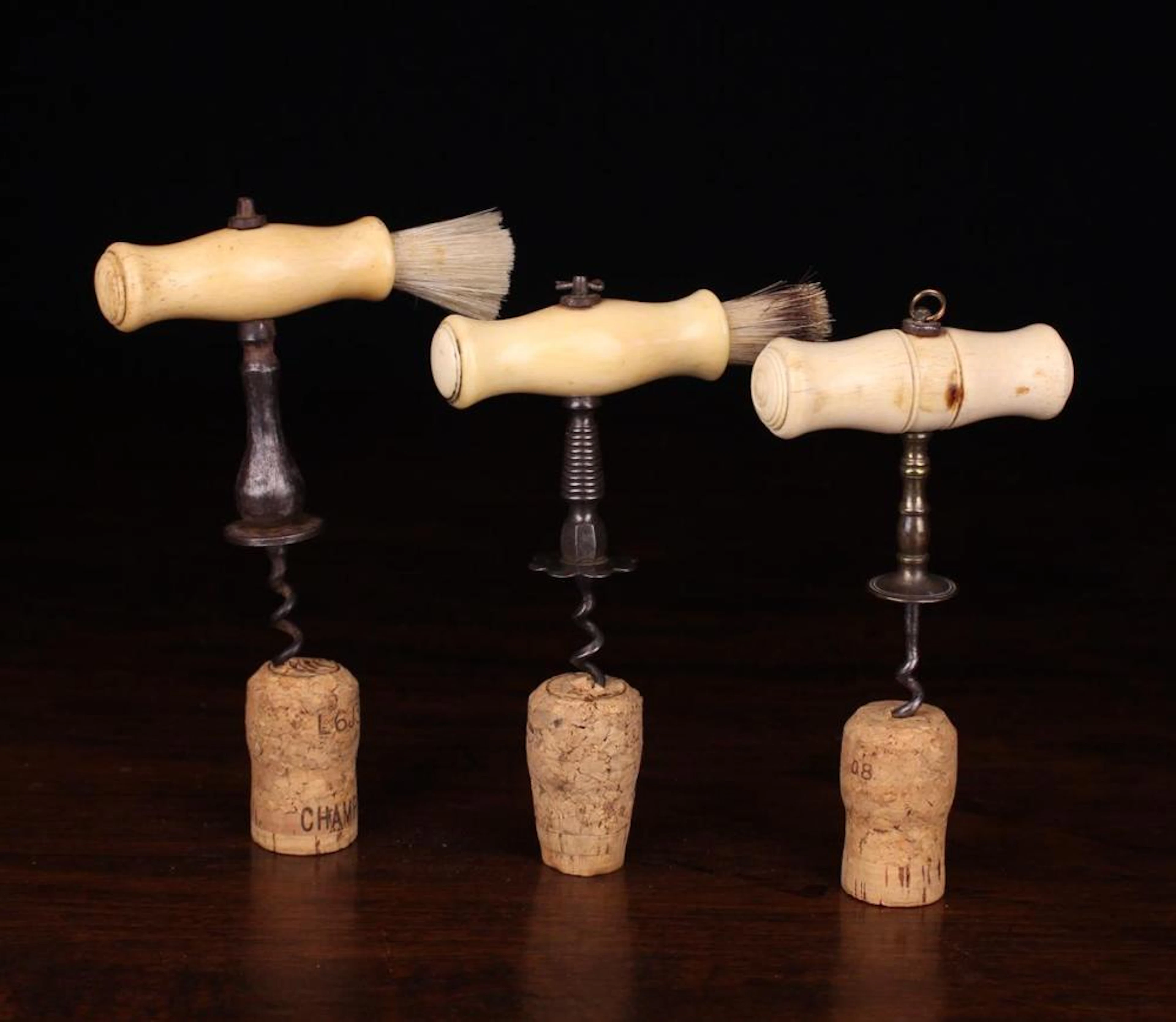 Three 19th Century Straight-pull Corkscrews having...