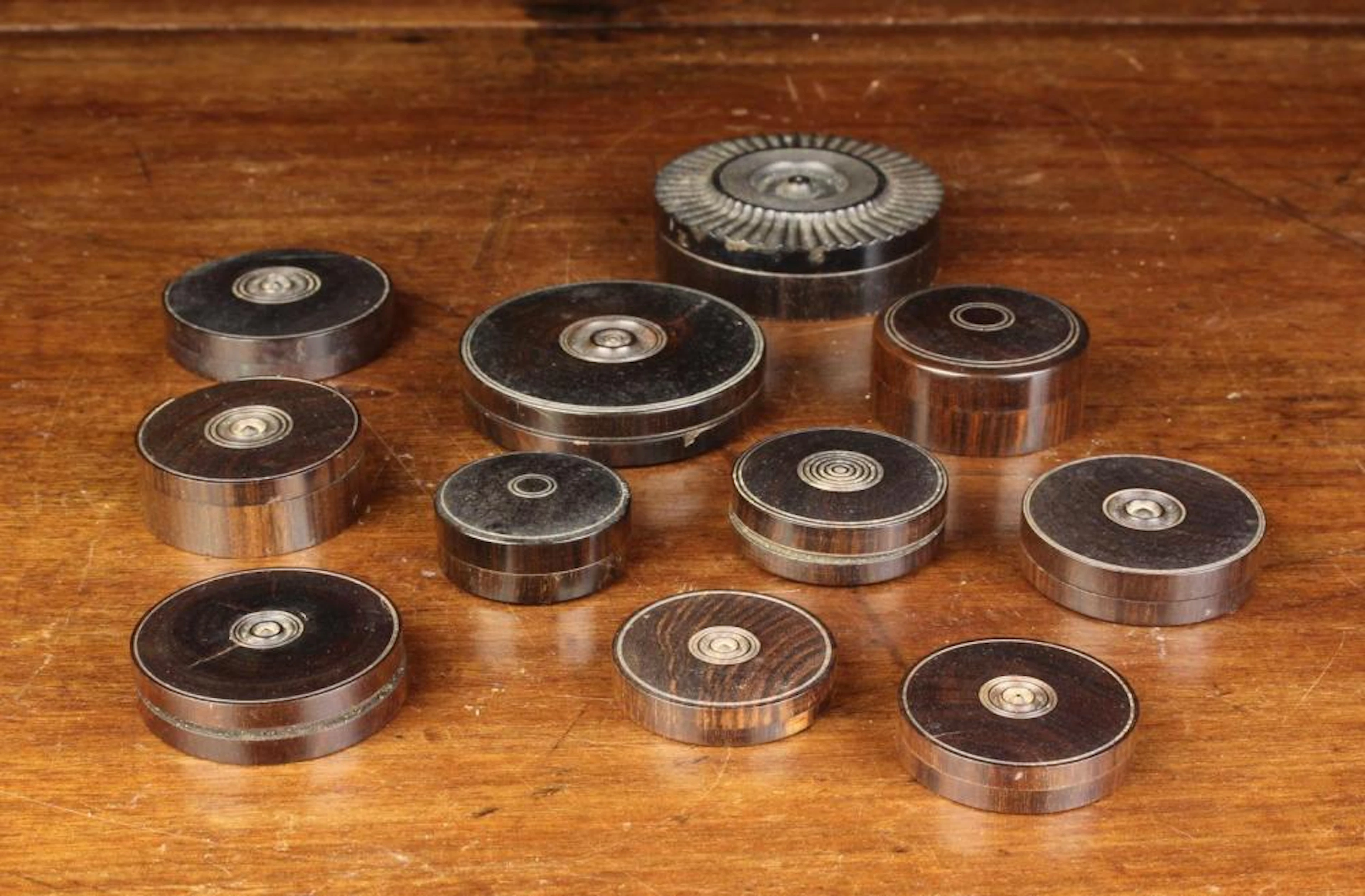 A Group of Eleven 19th Century Turned Lignum Seal Boxes