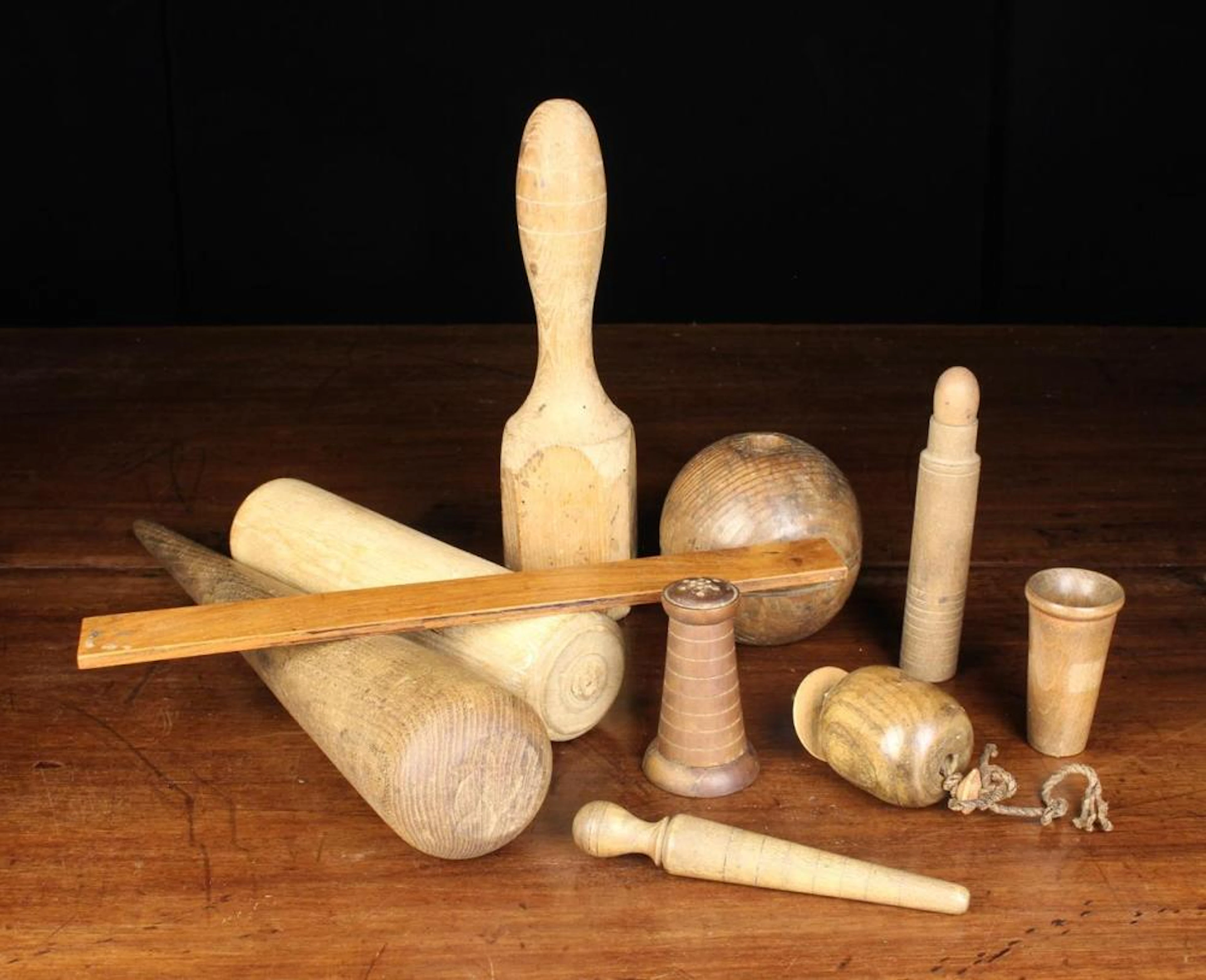 A Group of Treen Implements: A large beechwood fid 14½'' (37 cm) in length