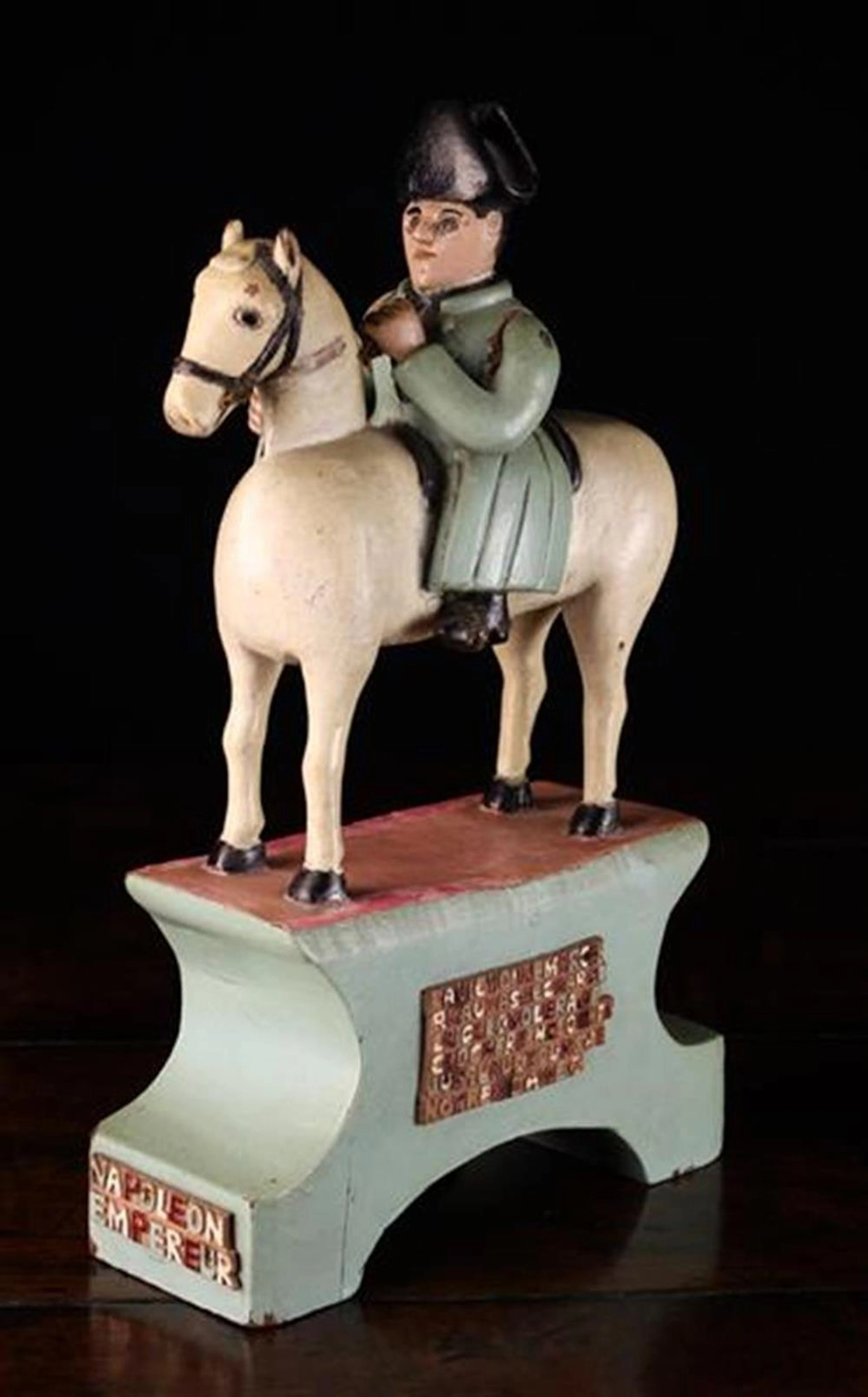 A Carved & Re-painted Folk Art Wooden Figure of Napoleon...
