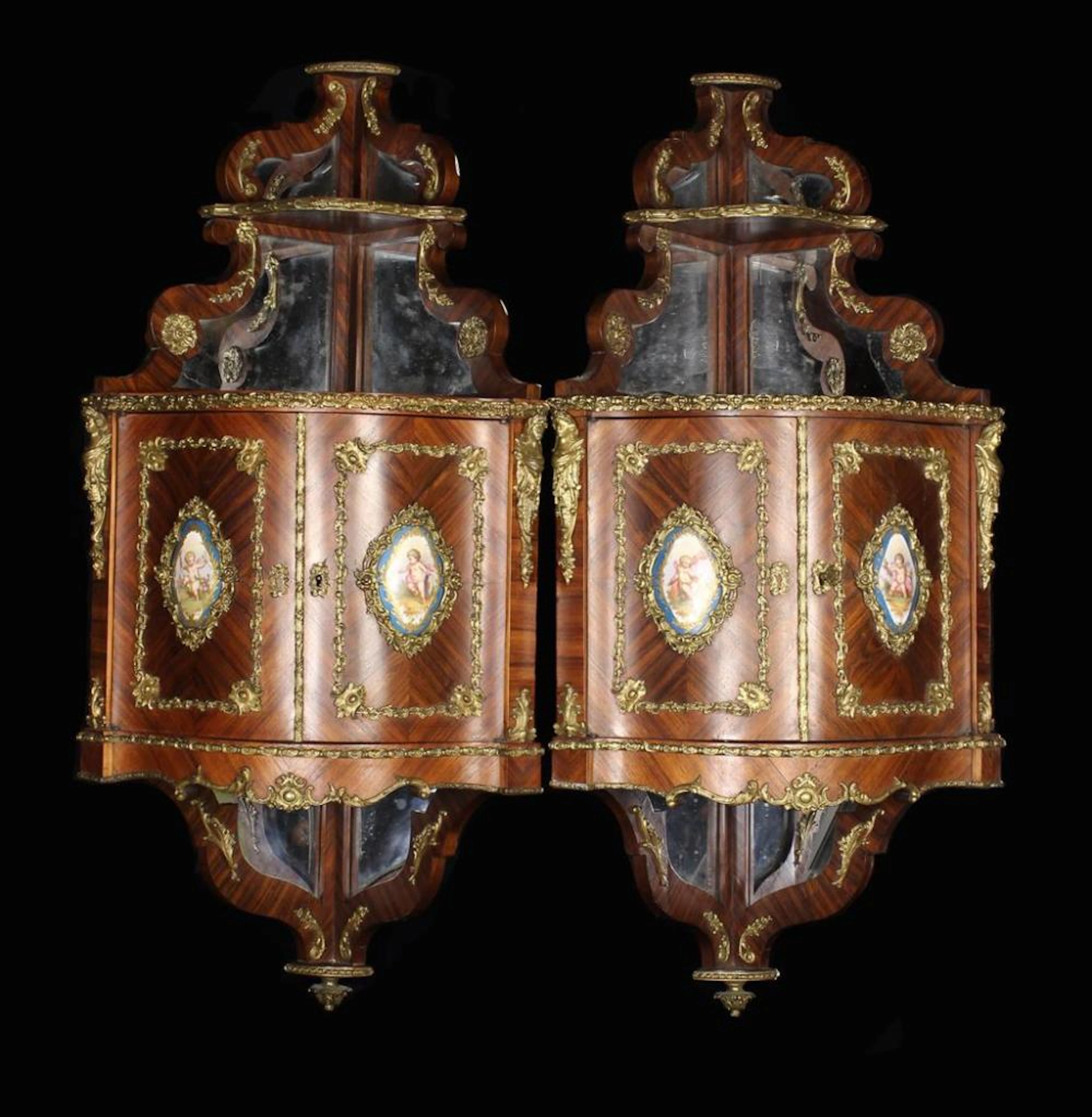 A Pair of Ornate Louis XV Style Hanging Corner Cabinets...