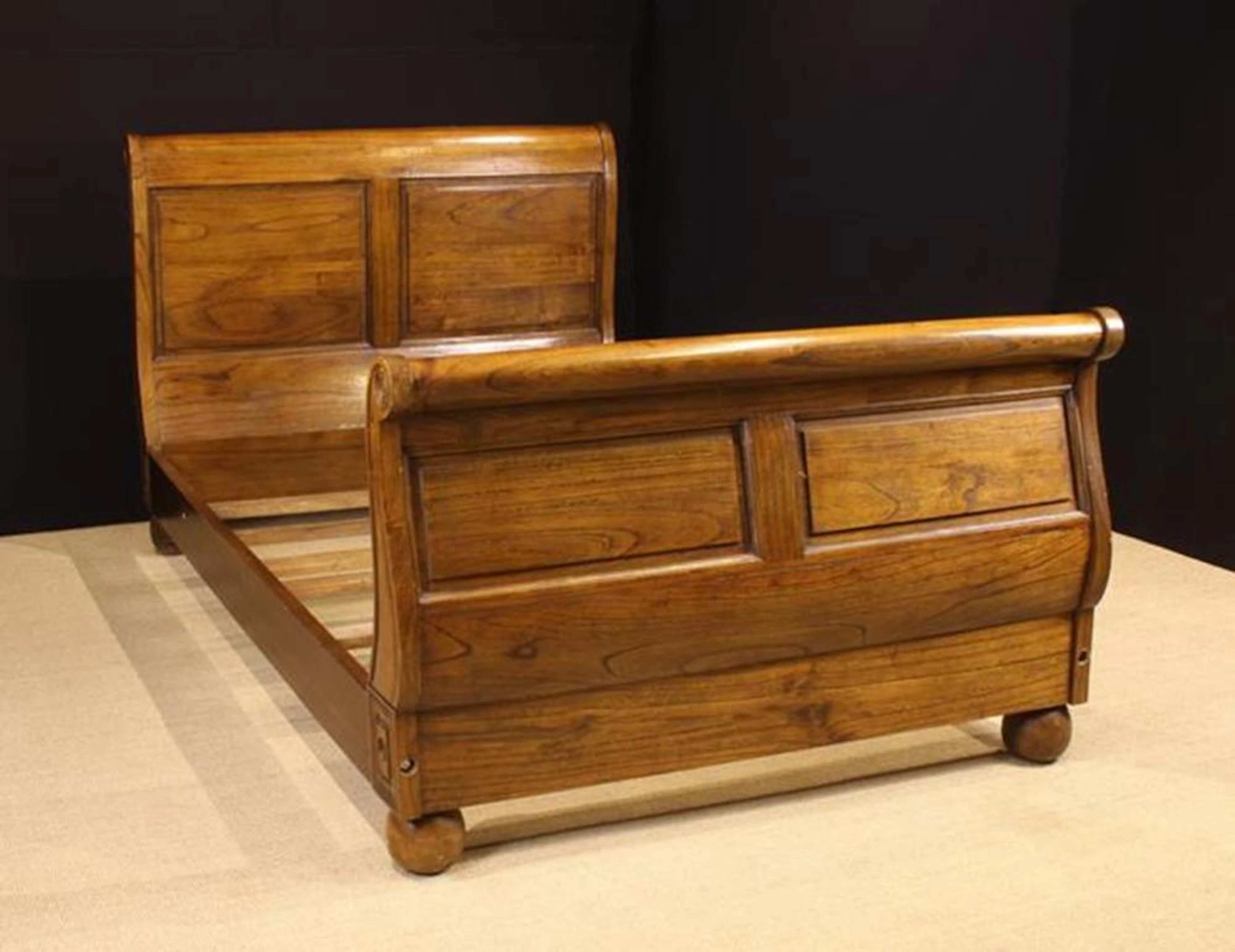 An Elm Bateau Lit/Sleigh bed