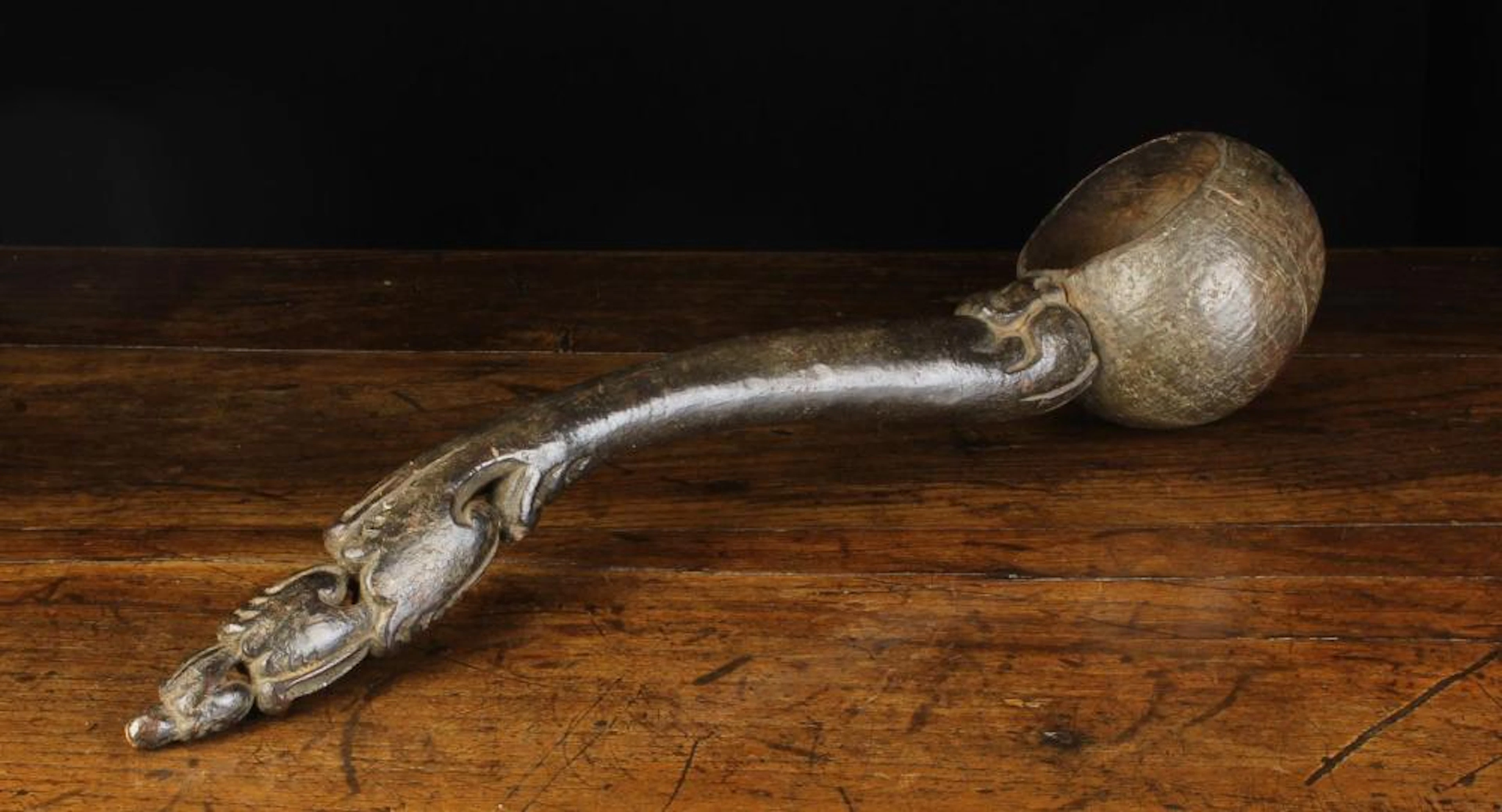 A Large Antique Asian Ladle