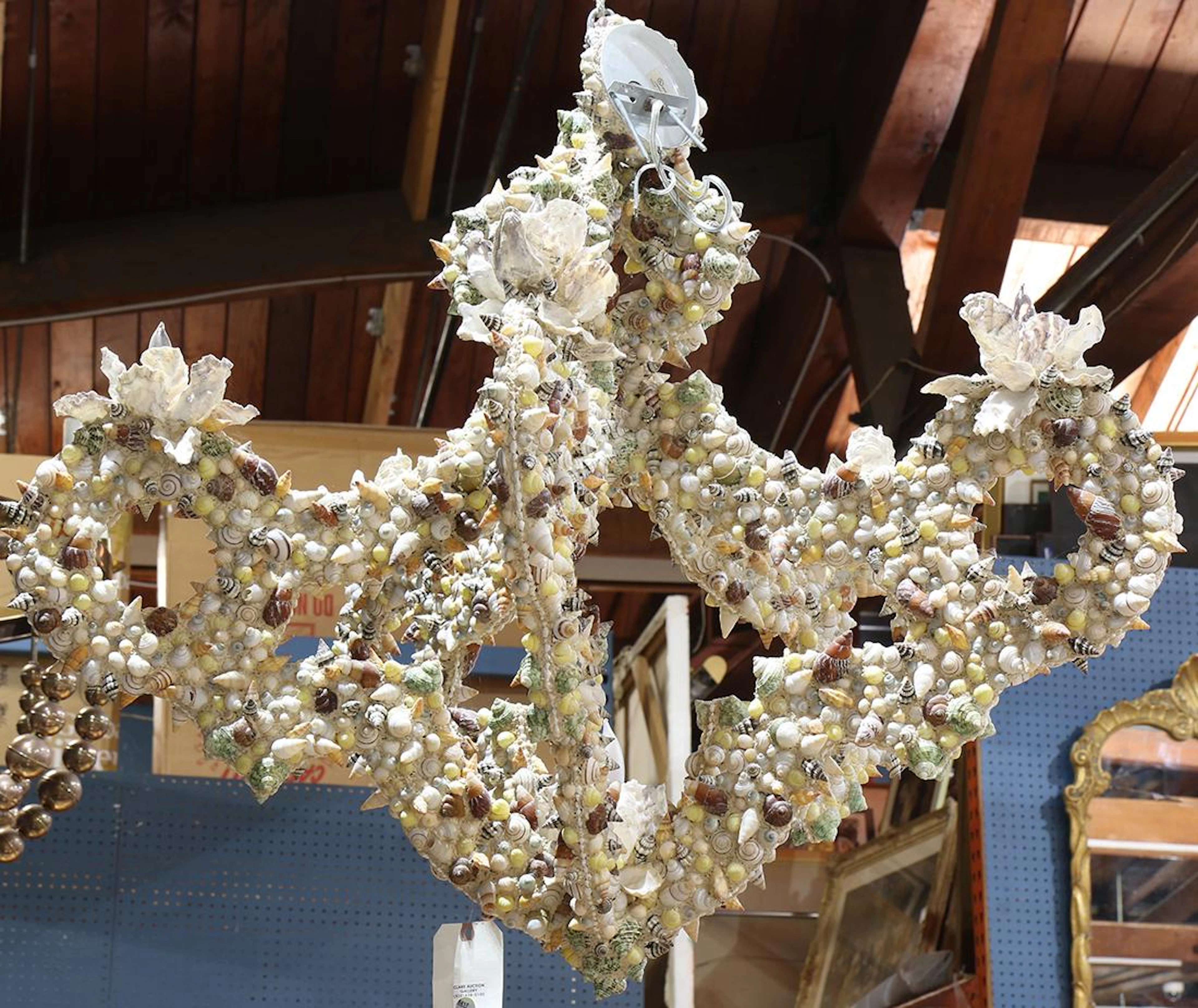 Grotto style custom shell encrusted chandelier
