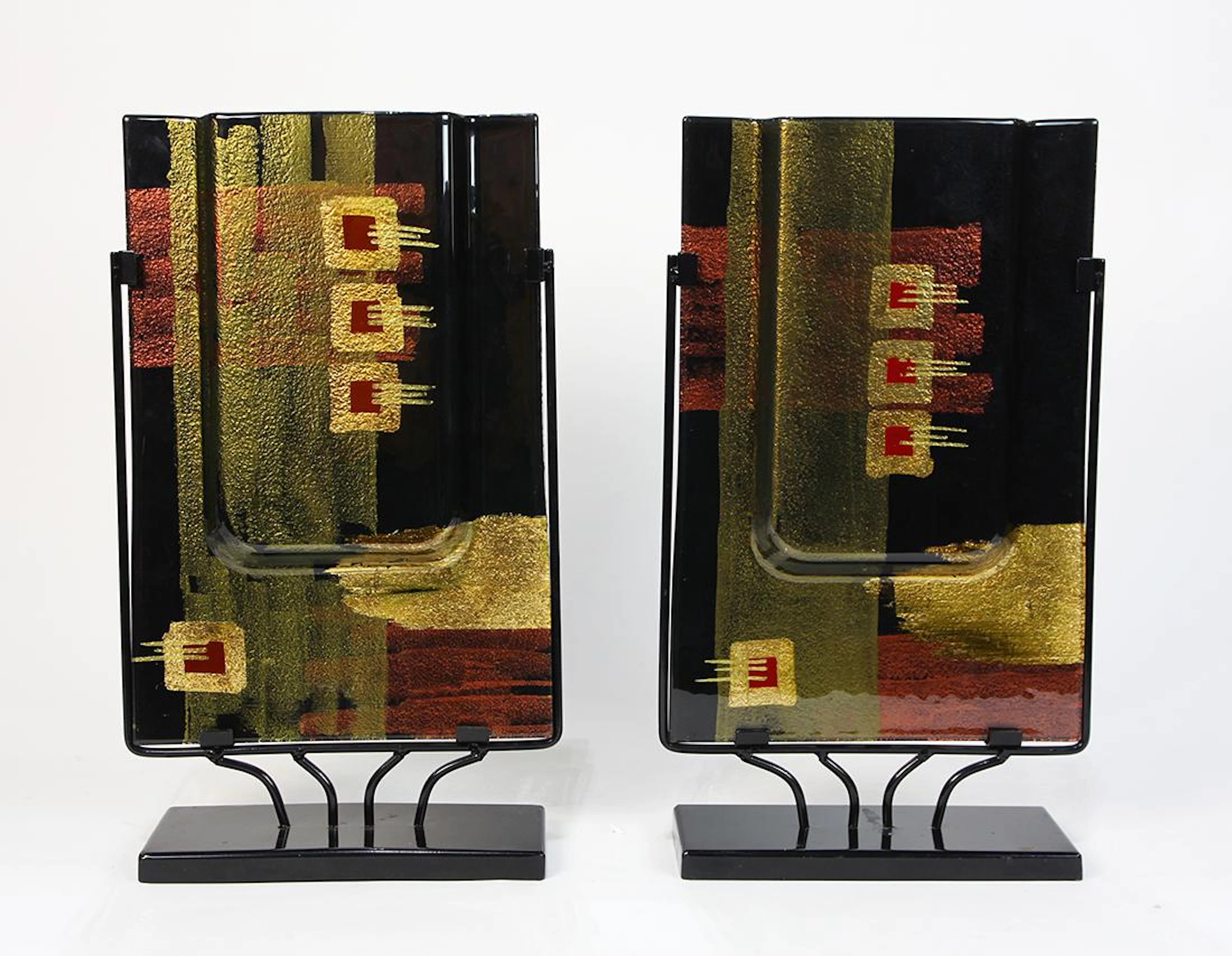 Pair of iridescent art glass sculptural vases, each