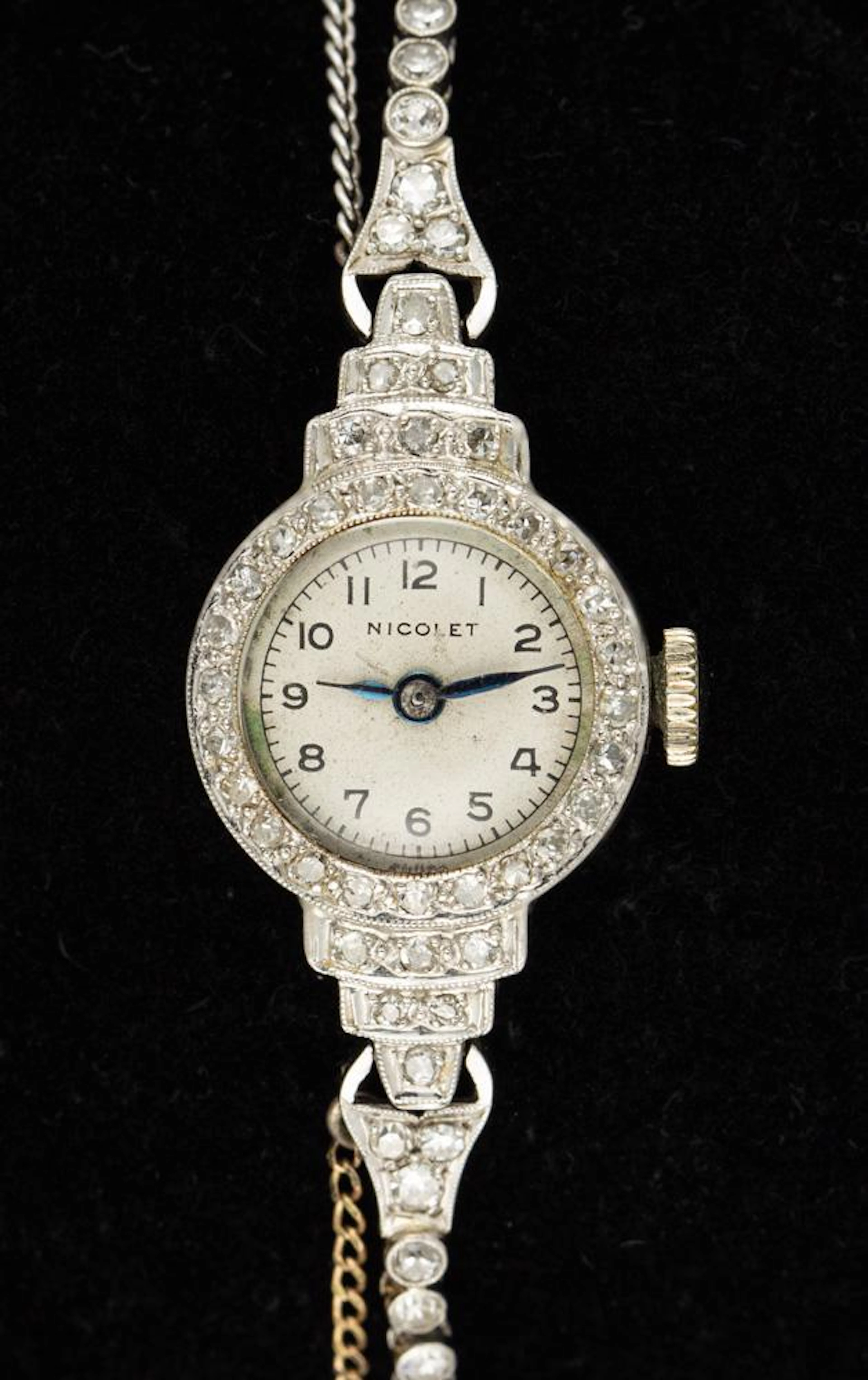 Lady's diamond, platinum, gold wristwatch