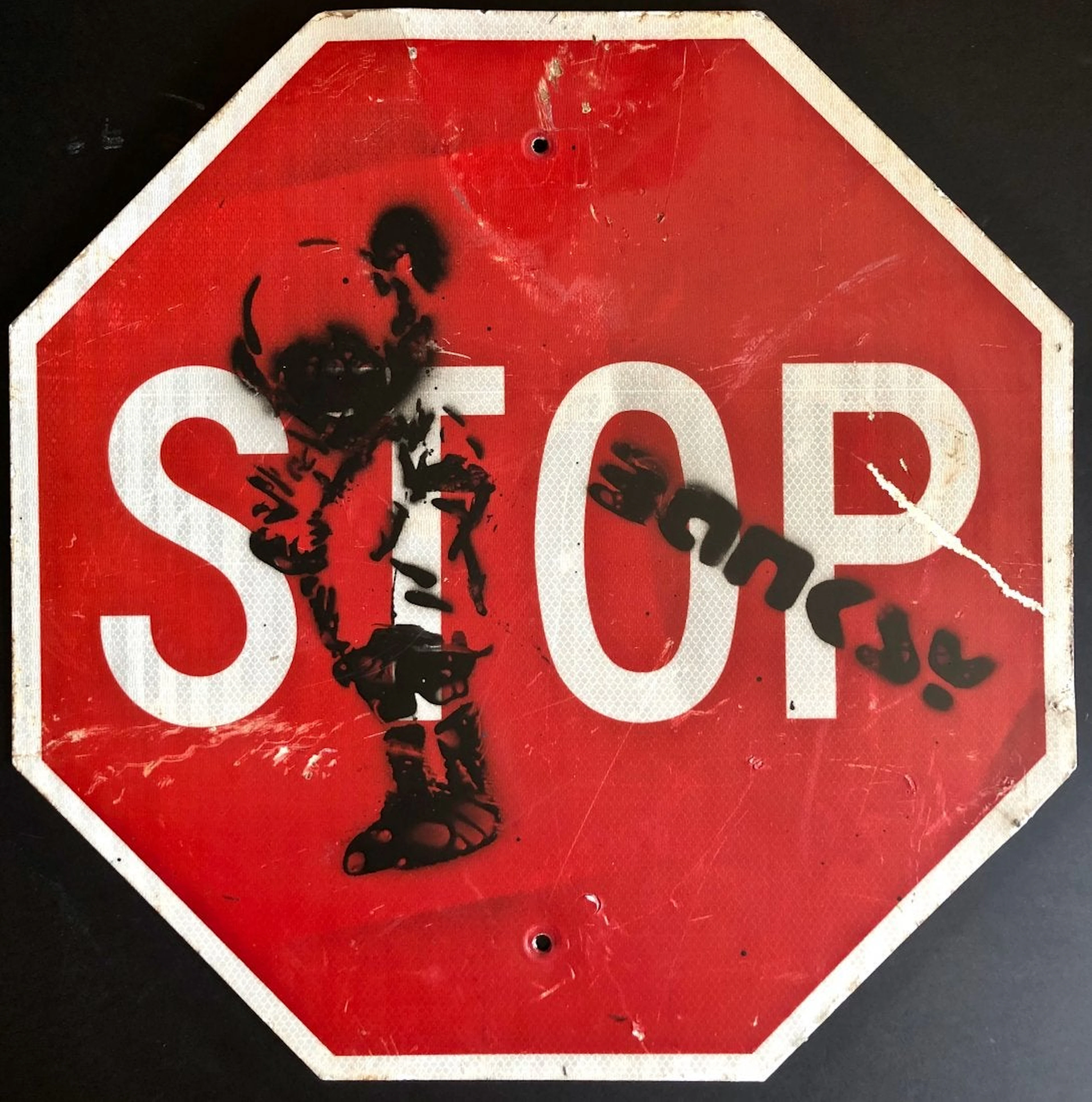 Bansky urban graffiti street art stop sign