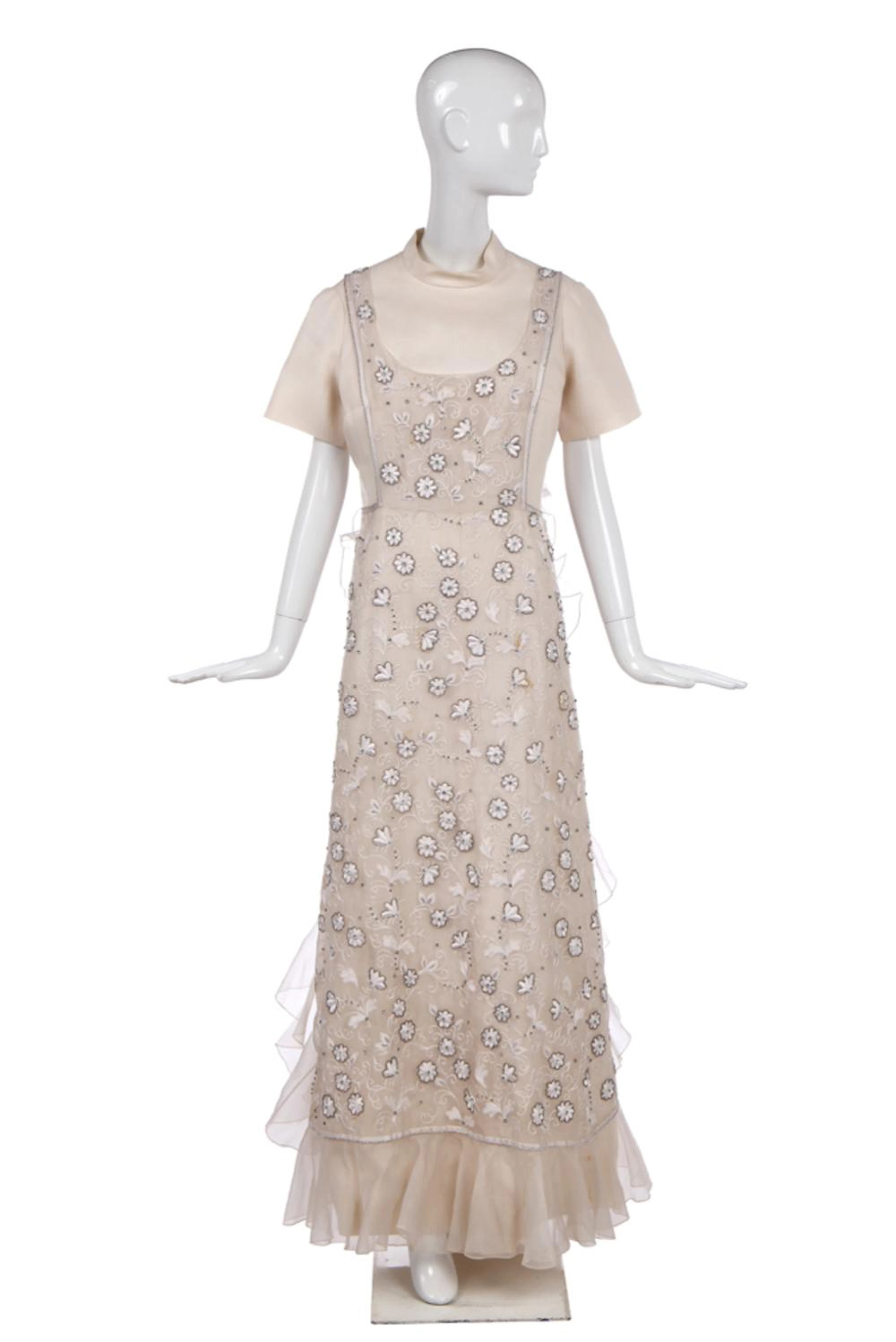 A Christian Dior by Marc Bohan off-white slubbed-gazar evening gown, early 1970s