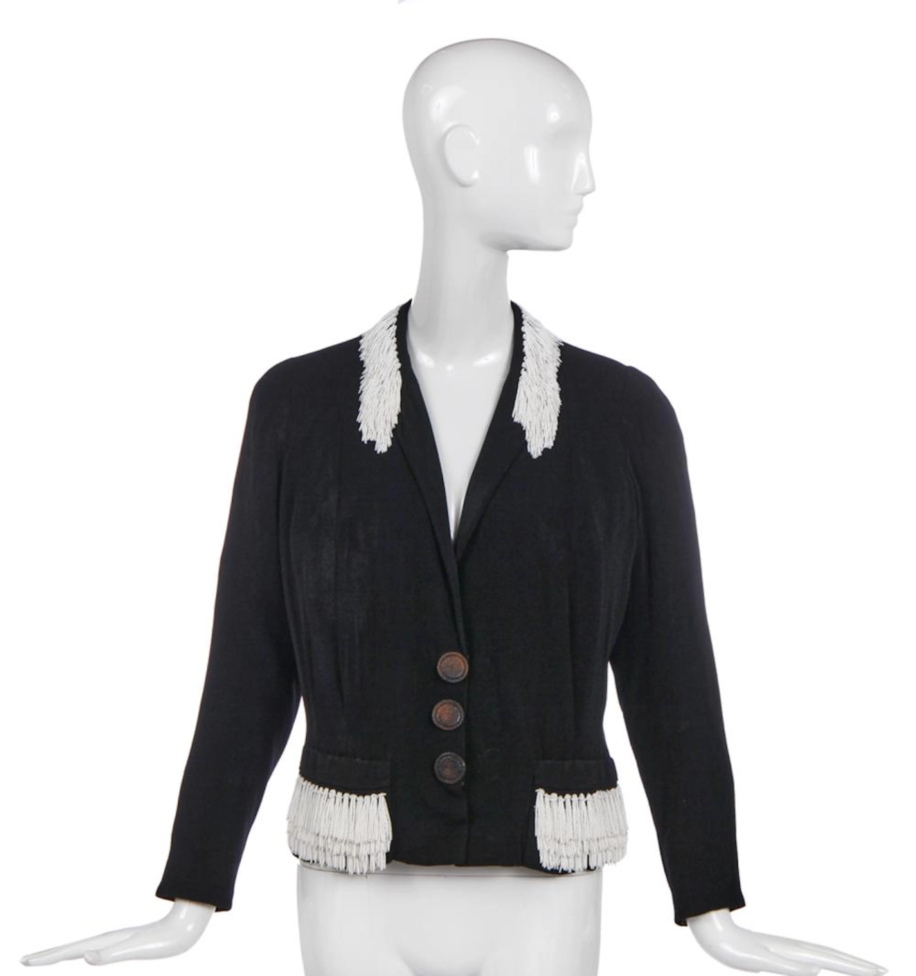 An Elsa Schiaparelli couture black wool-crêpe jacket, circa 1935