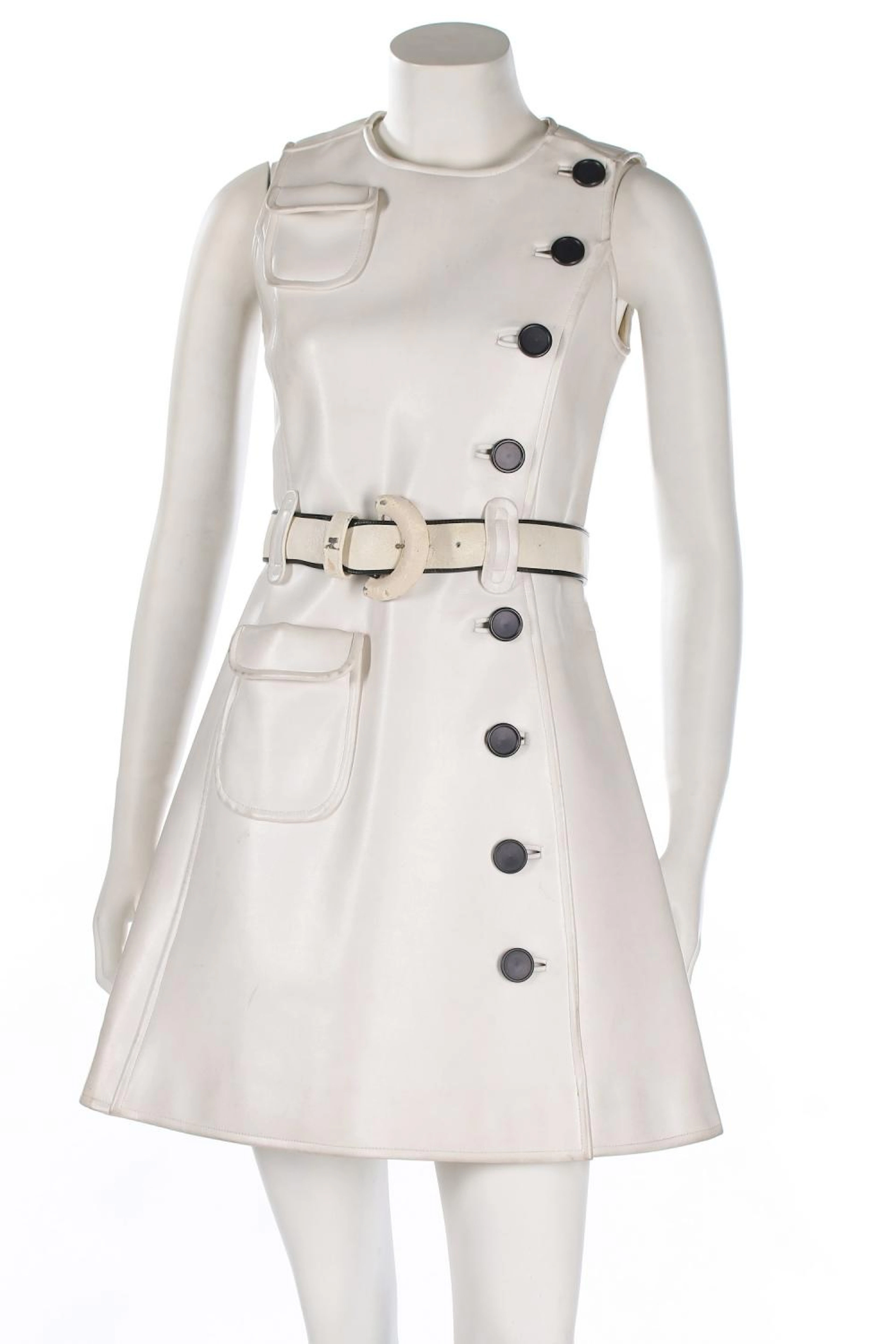 An André Courrèges white vinyl pinafore mini-dress, late 1960s, black on wh