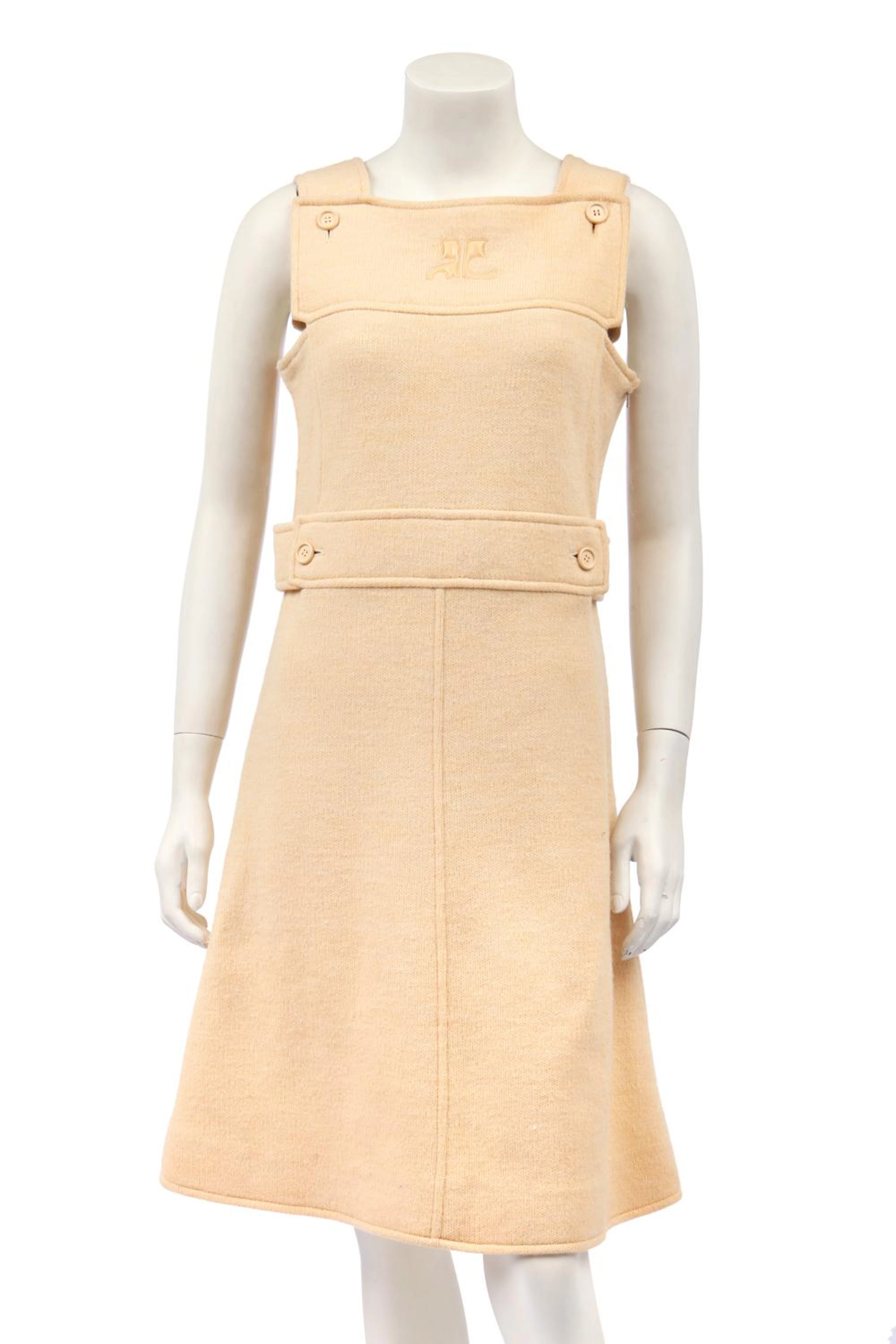 A Courrèges beige pinafore dress, circa 1970,