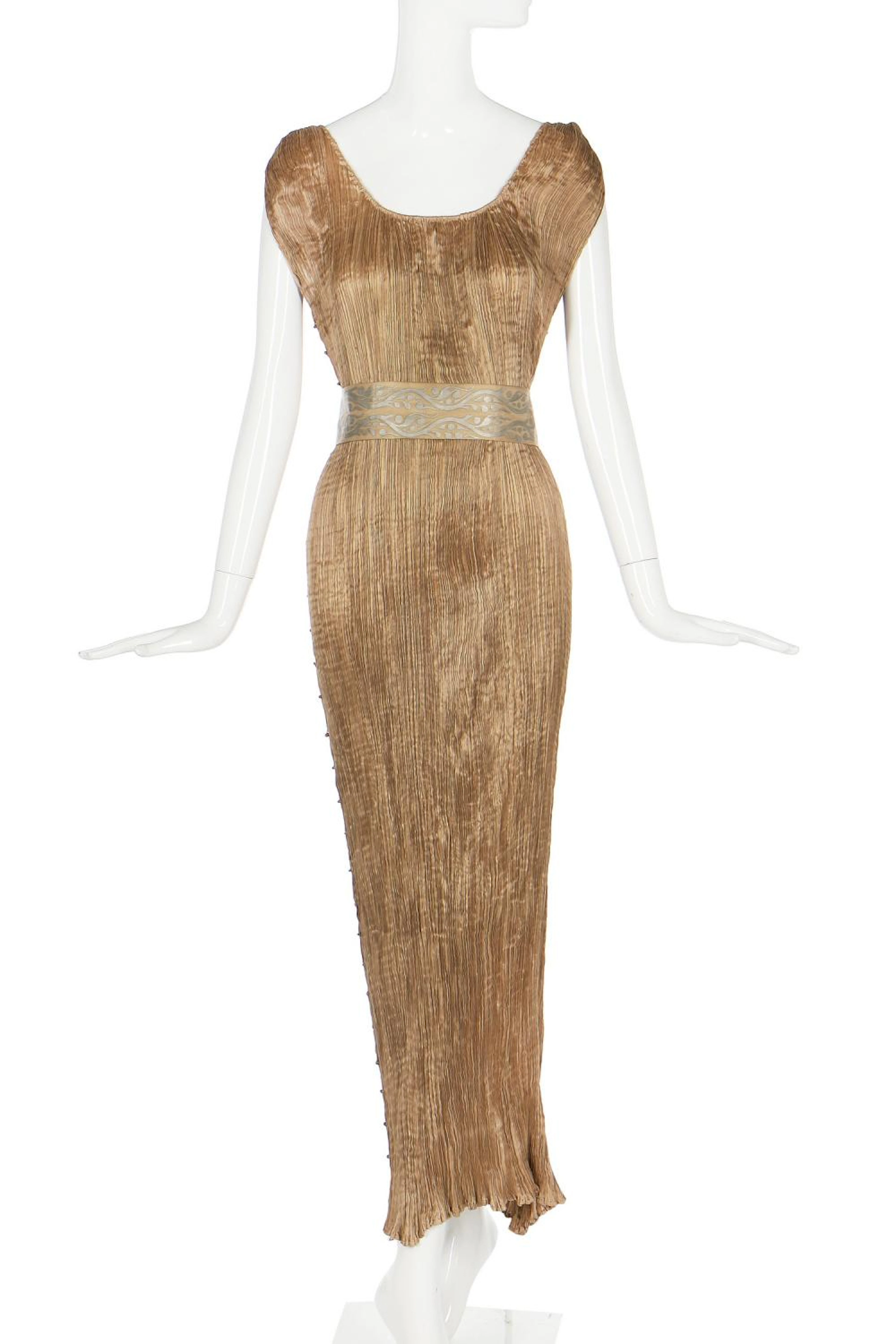 A Mariano Fortuny pale-gold pleated silk Delphos gown, 1920-30,