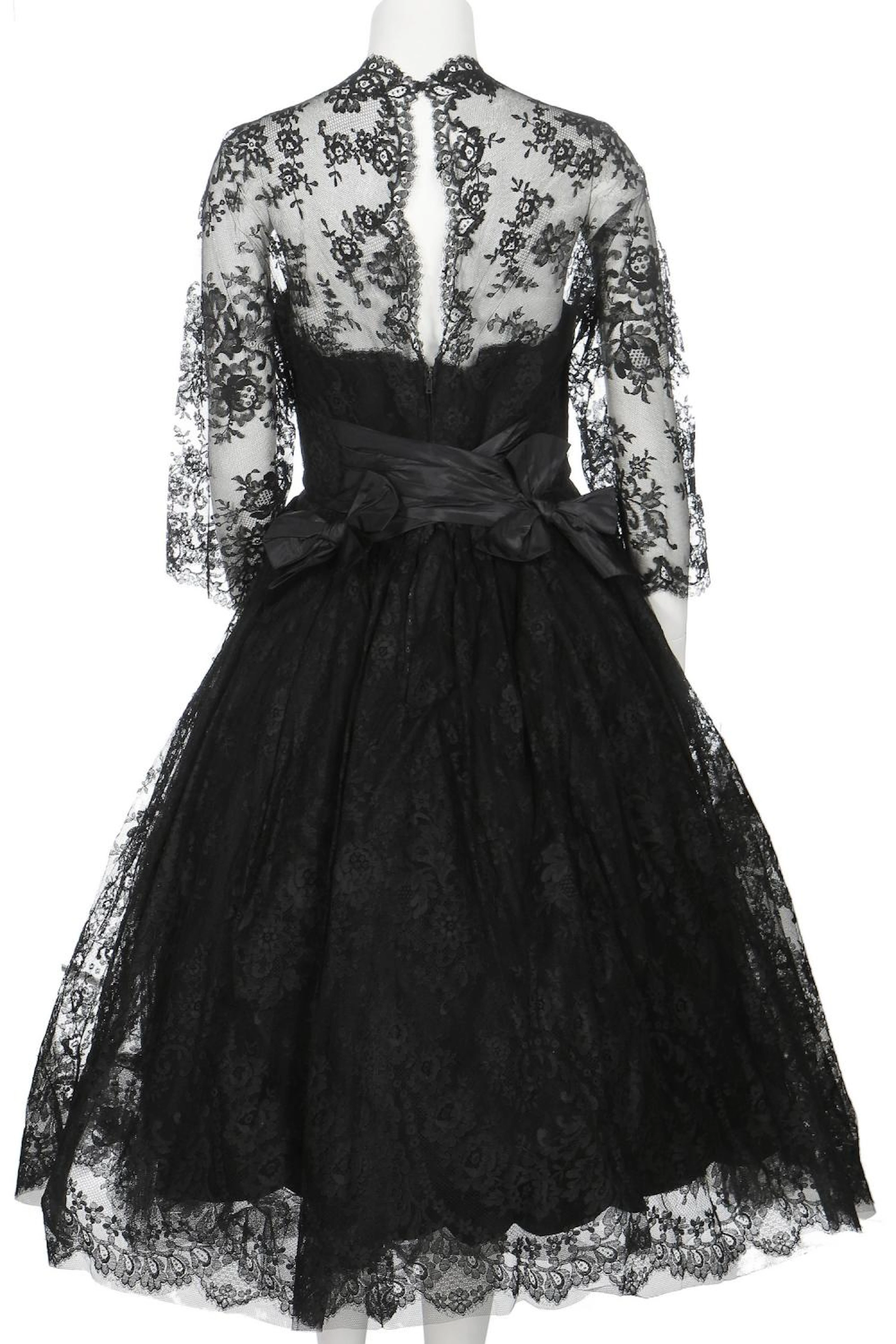 A Norman Hartnell couture black Chantilly cocktail dress, circa 1955,