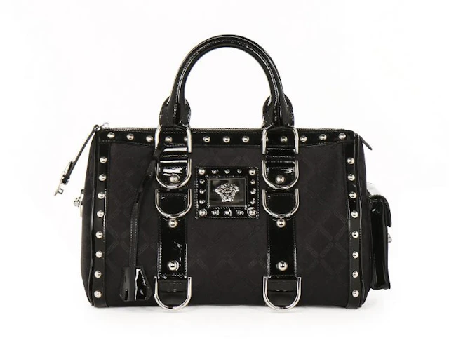 A Versace 'Snap Out Of It' black patent leather handbag, probably 2007, sta
