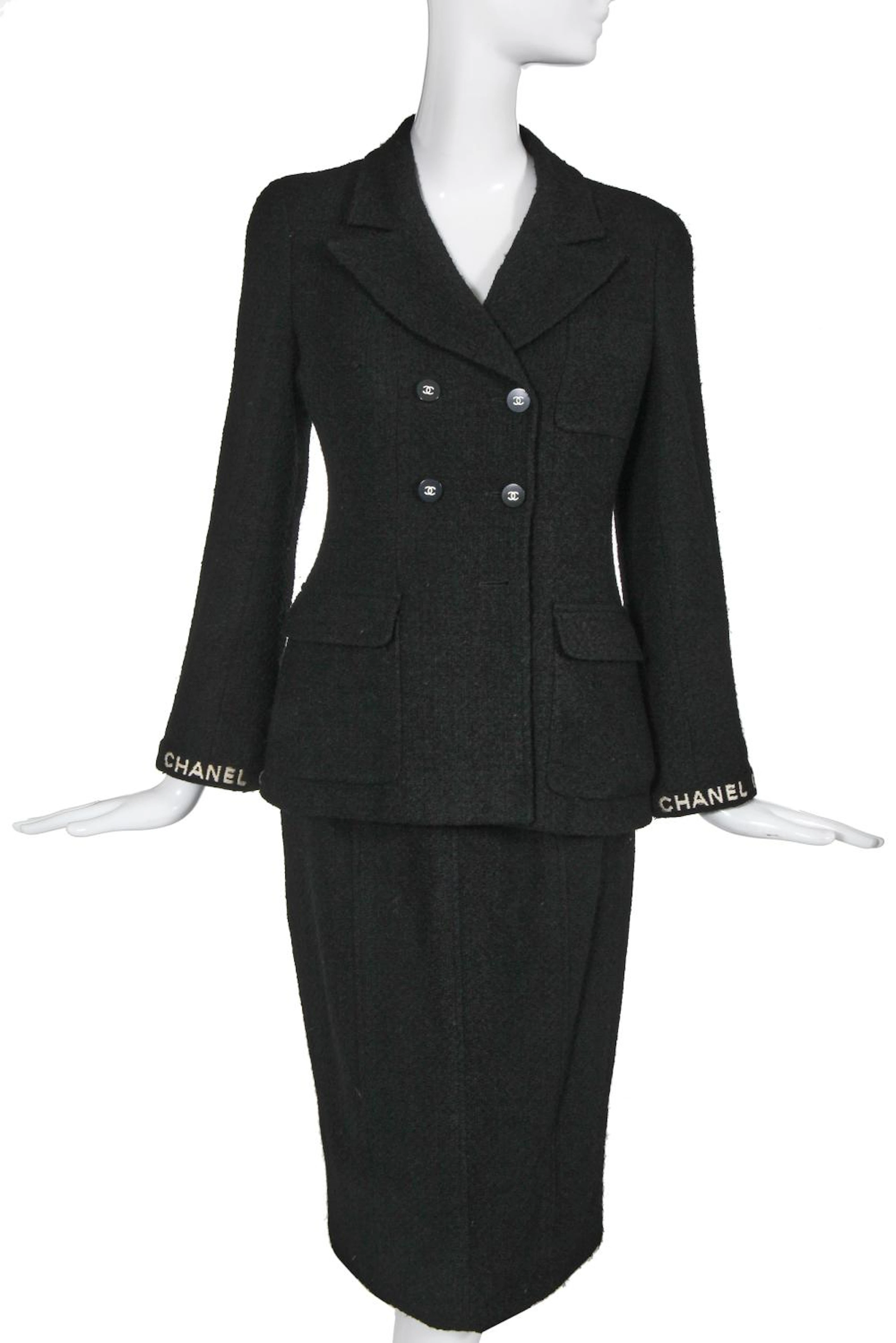 A Chanel black bouclé wool suit, Autumn-Winter 1995-96
