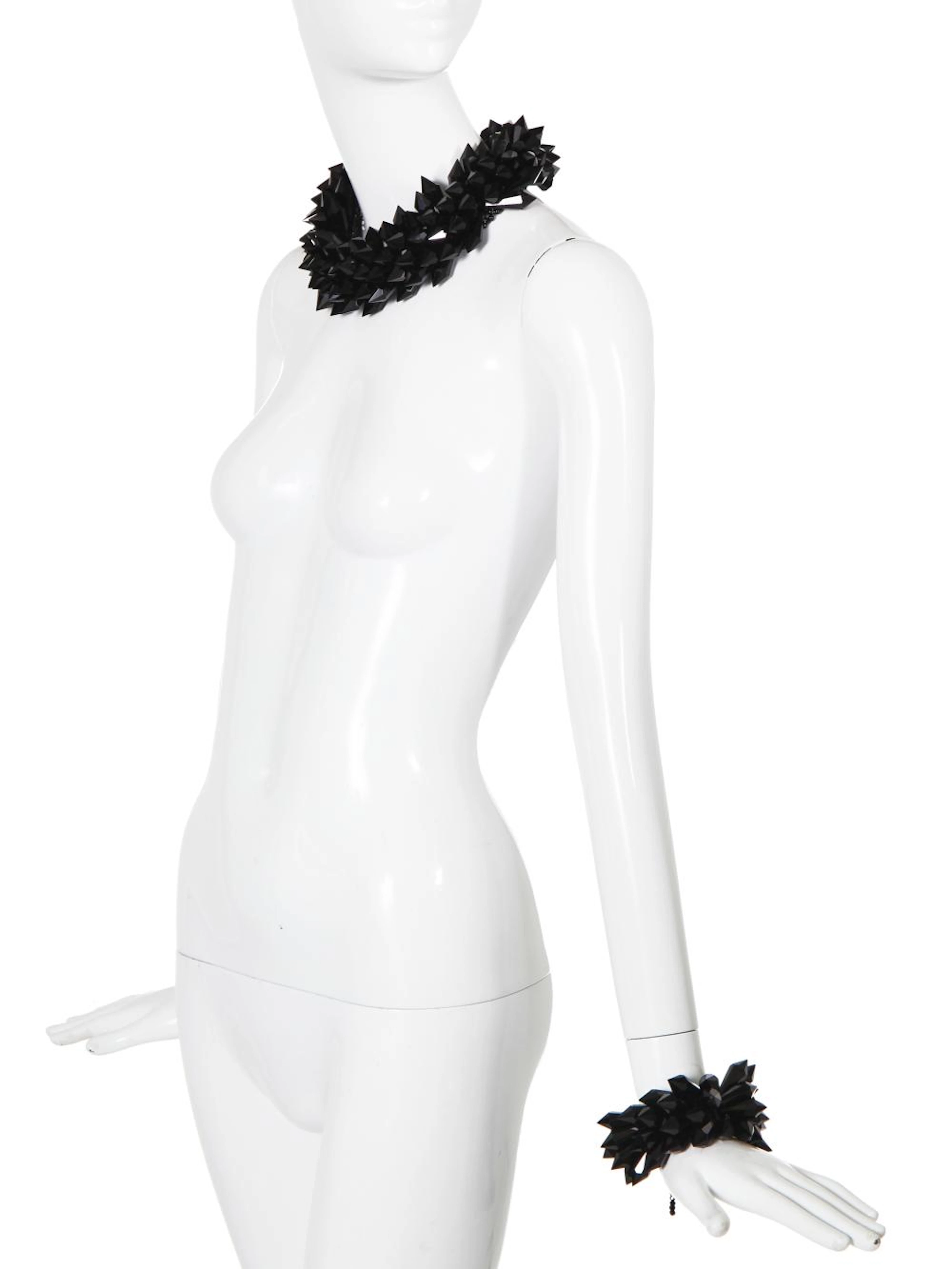 A choker necklace and matching bracelet of black cut-glass