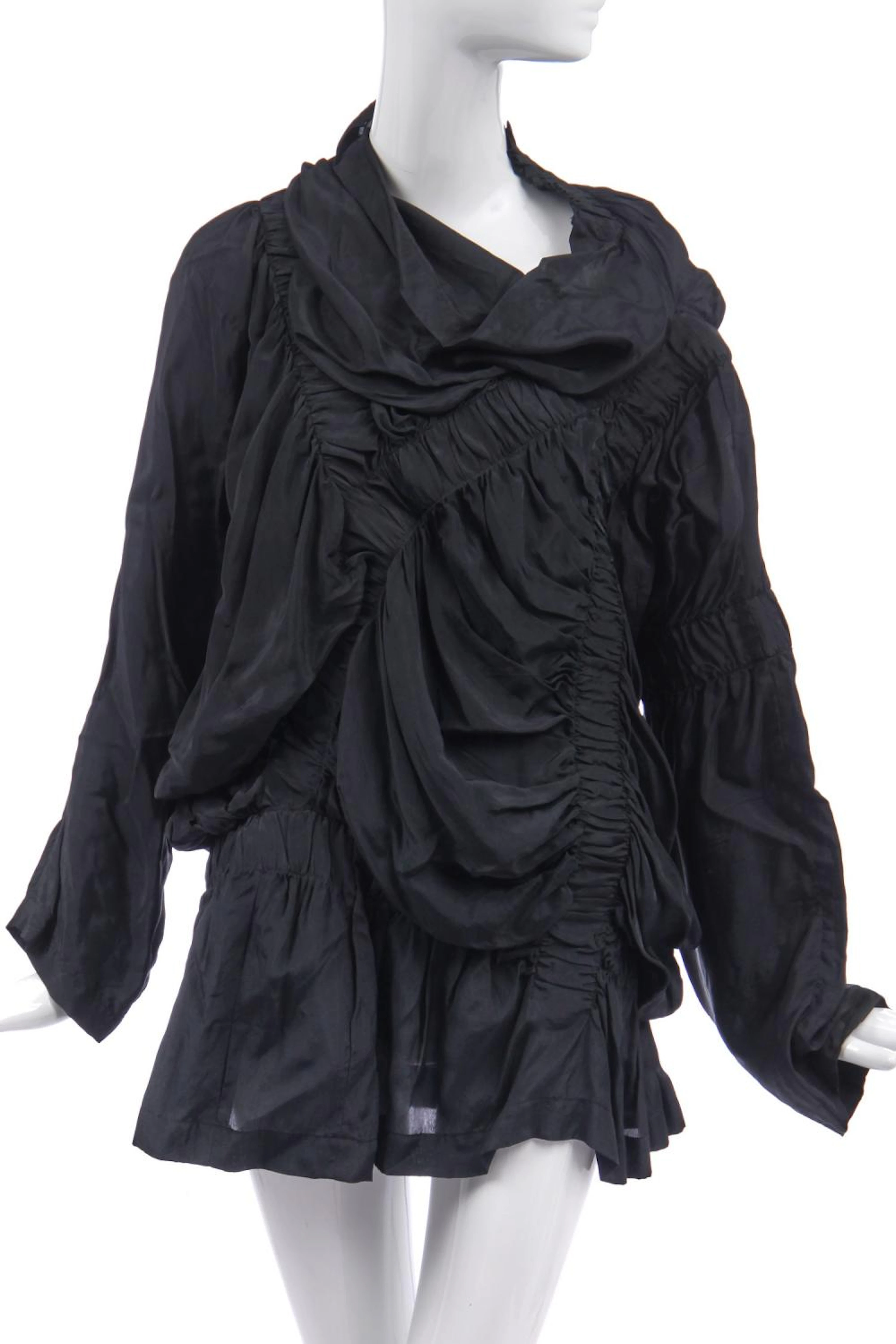 An early Comme des Garçons ruched black synthetic top/dress, Spring-Summer 1984,