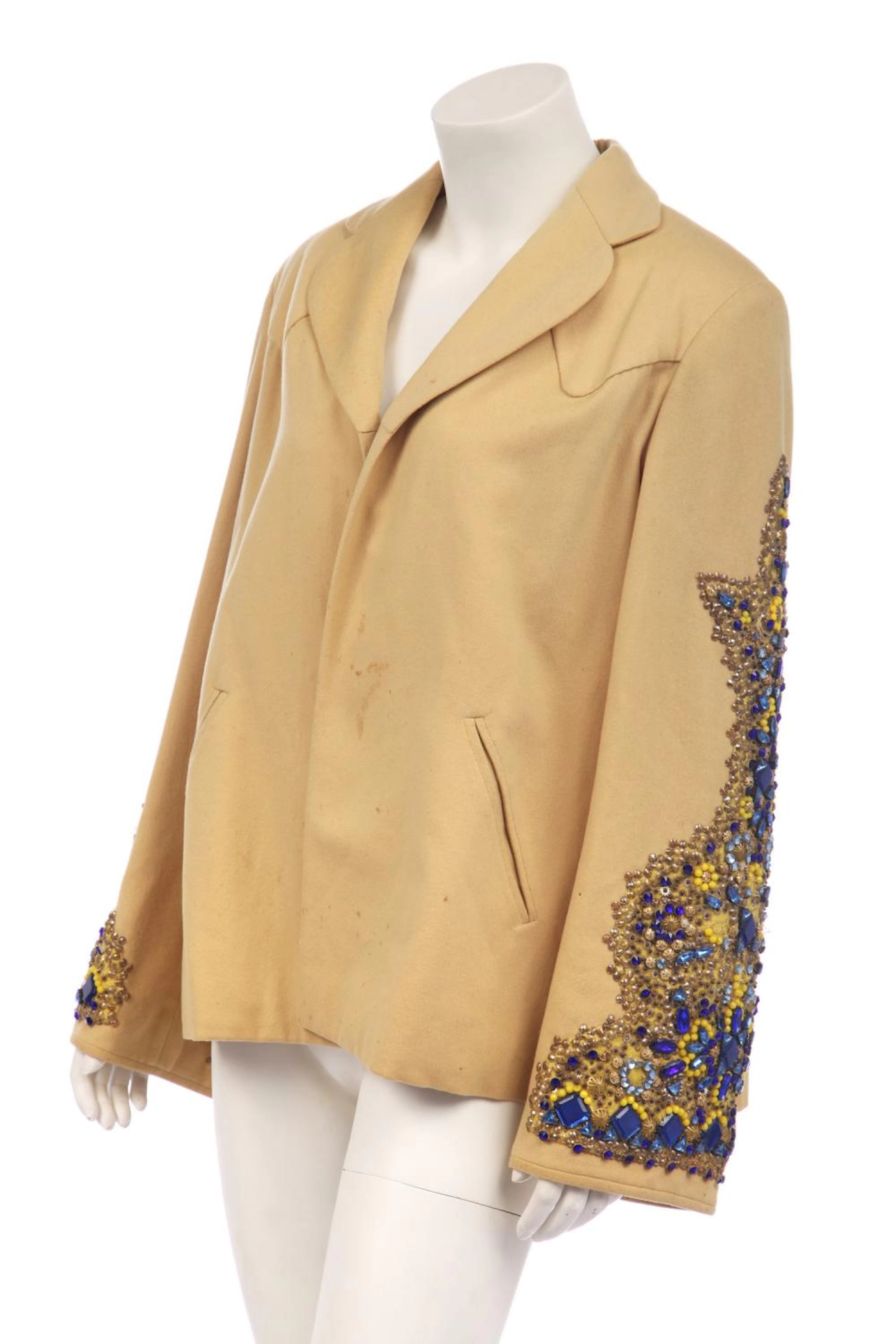 A Norman Hartnell embellished yellow wool jacket, late 1940s,